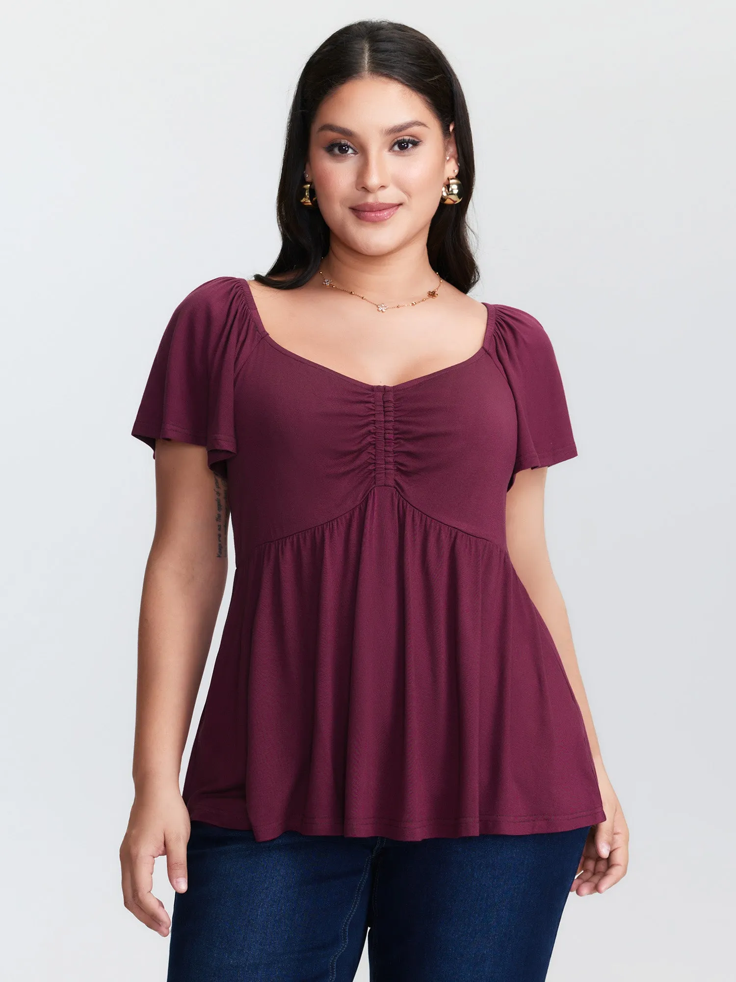 Stretchy Ruched Bodice Pleated Knit Top sold by Bloomchic