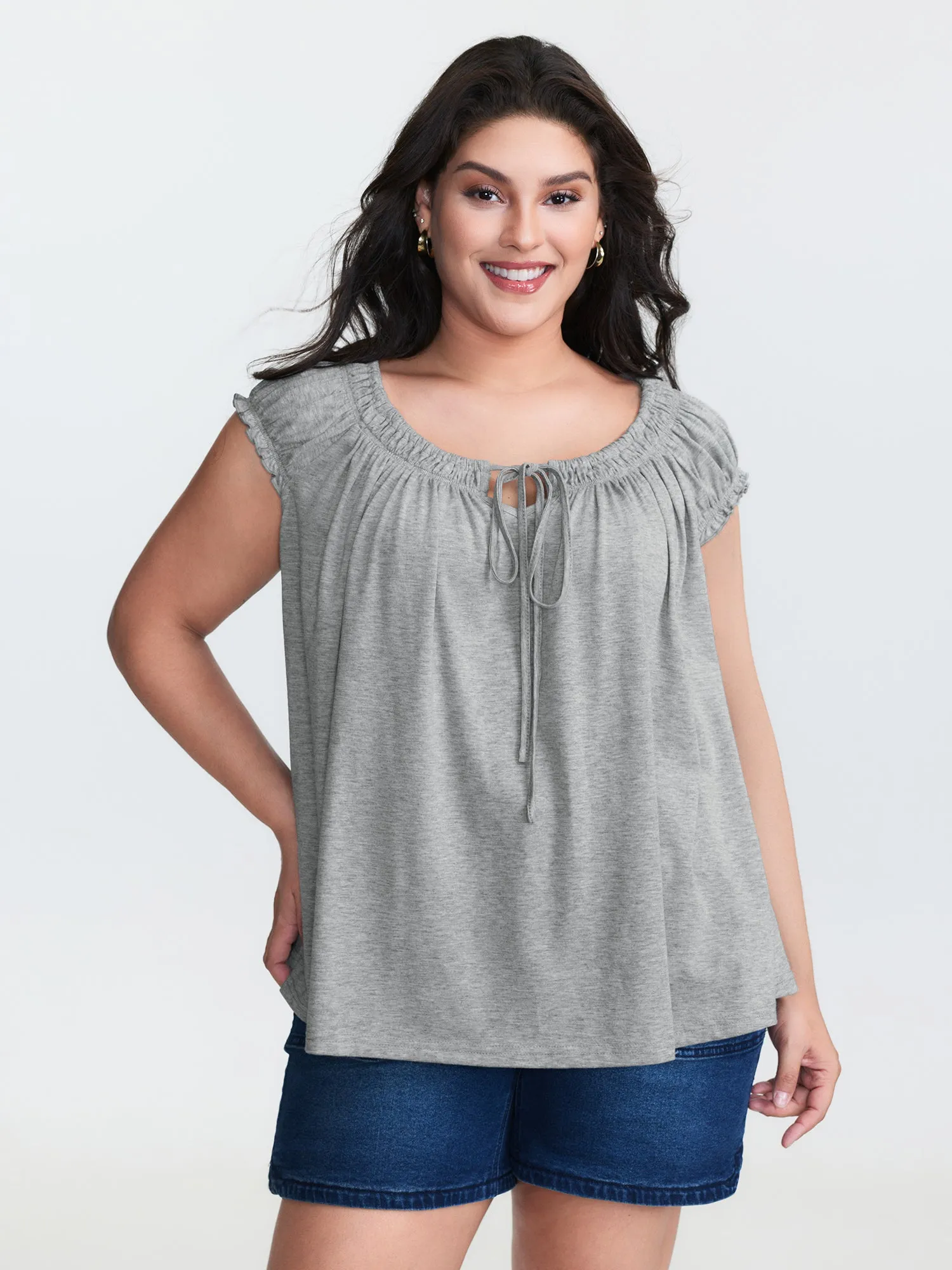 Supersoft Shirred Drawstring Neckline Flowy Top sold by Bloomchic