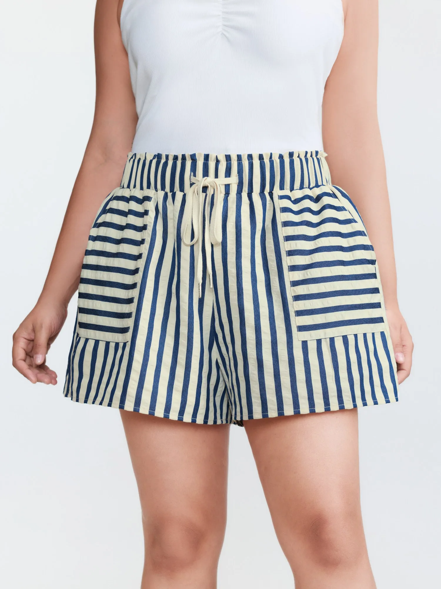 Asymmetrical Stripes Pockets Lined Shorts sold by Bloomchic