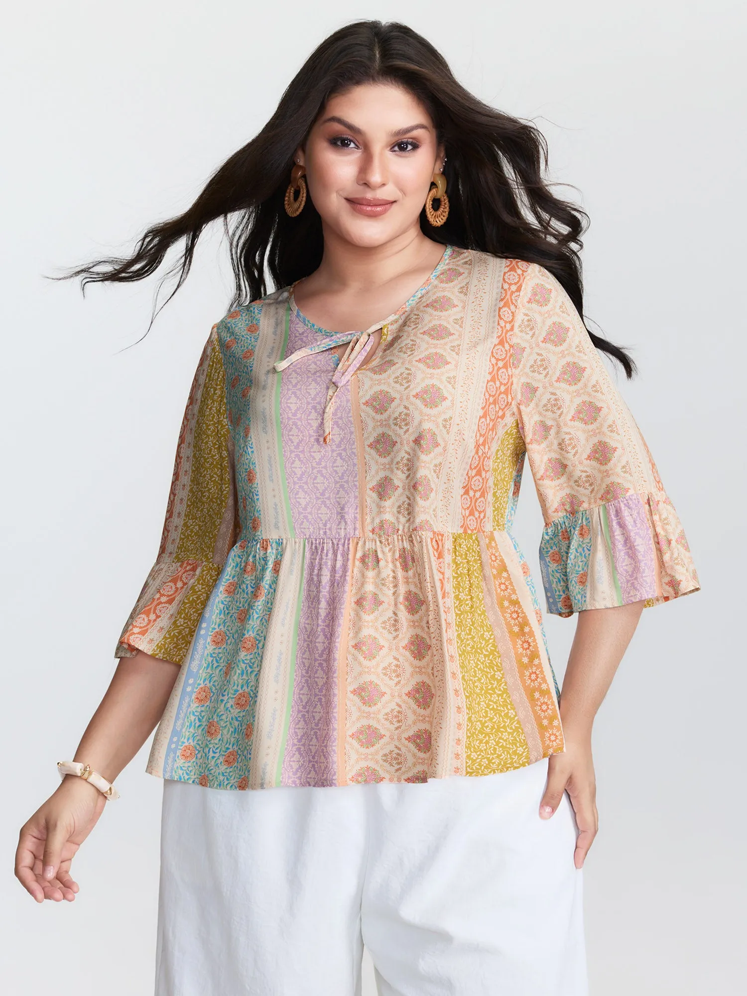 Colorful Printed Stripe Flared Blouse sold by Bloomchic