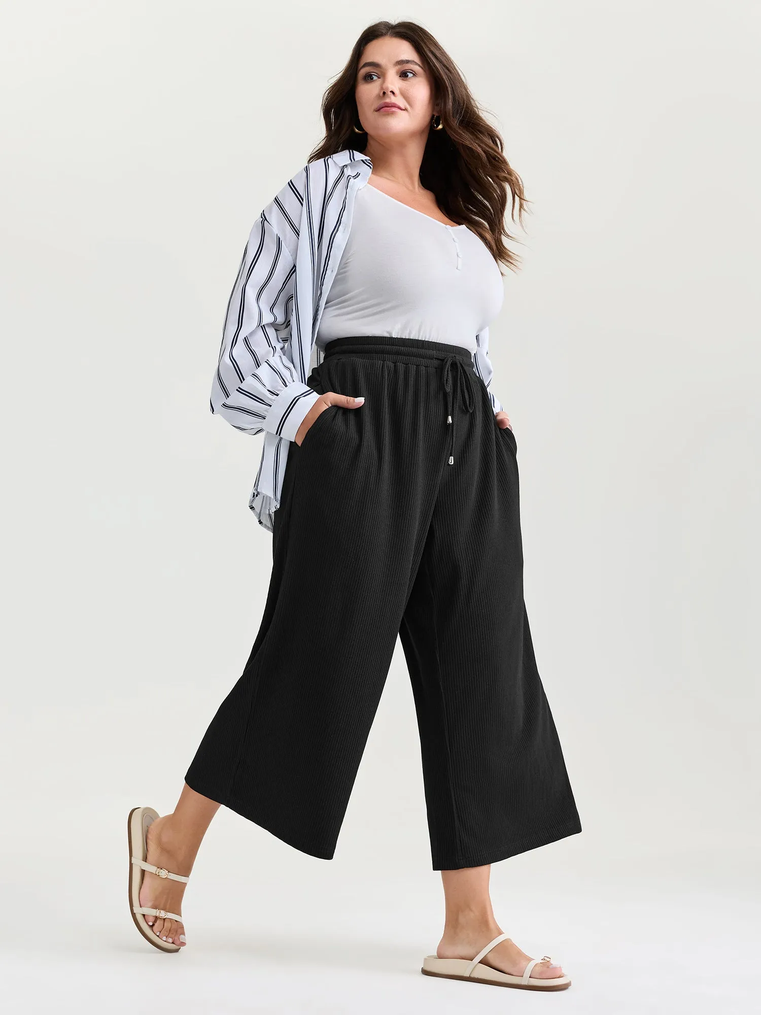 Drawstring Waist Stretchy Textured Sweatpants sold by Bloomchic
