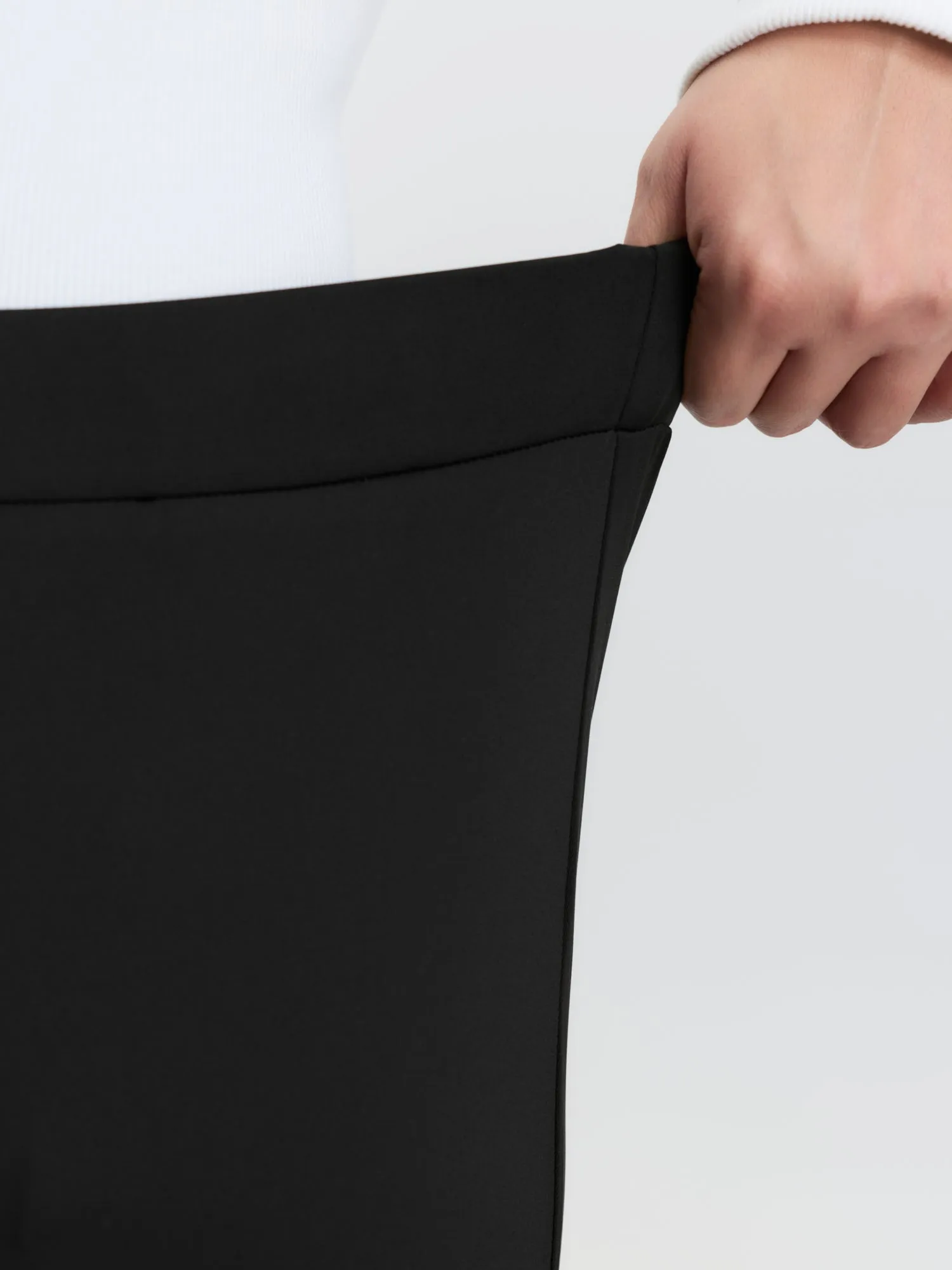 Stretchy Button Split Hem Leggings sold by Bloomchic product image thumbnail 3