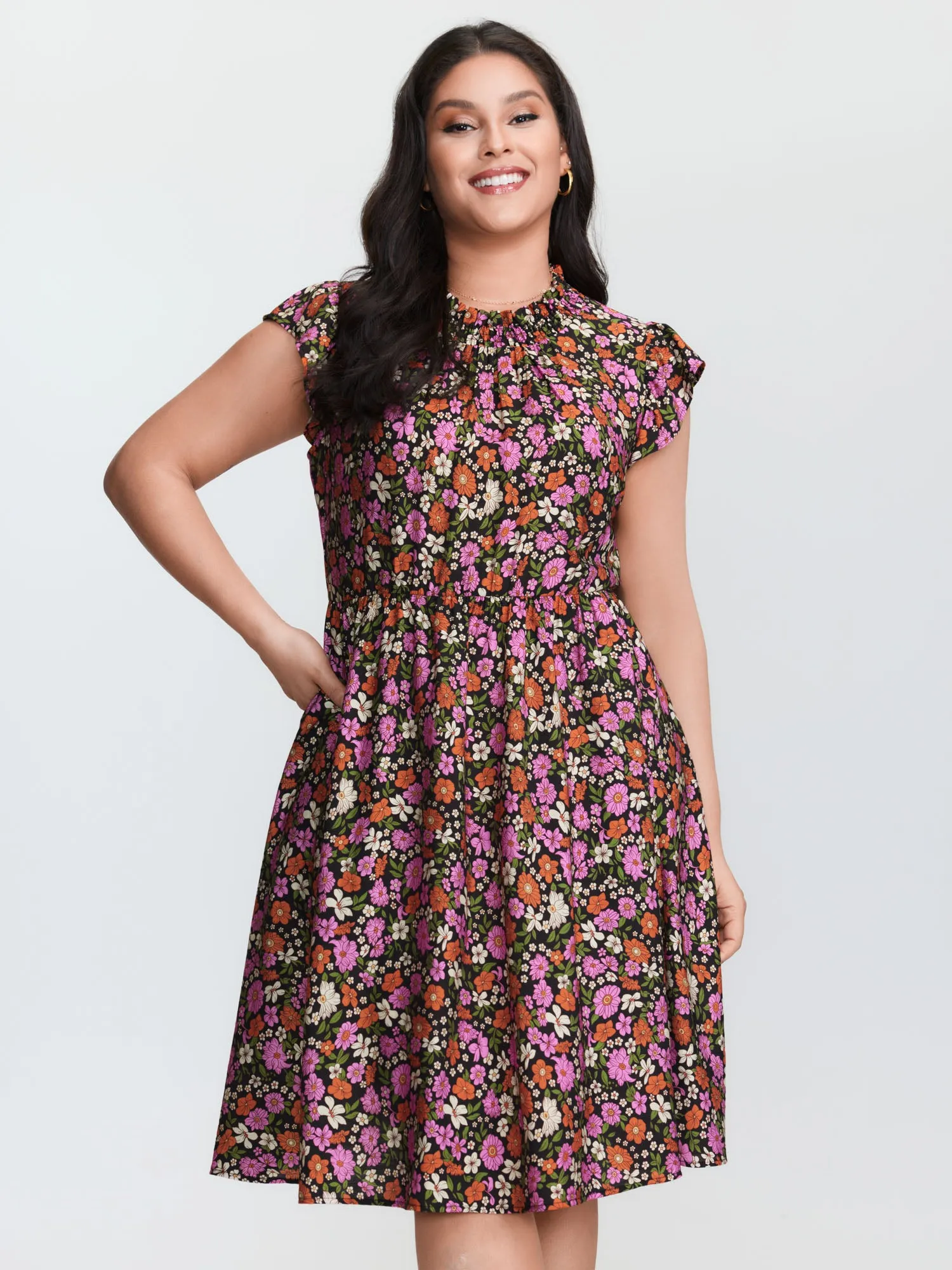 Chic Floral Print Ruffled Mock Neckline Mini Dress sold by Bloomchic
