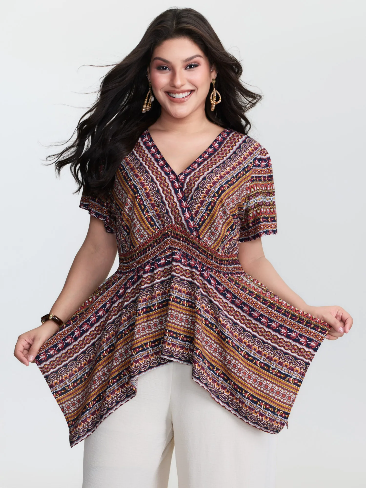 Boho Striped Print Handkerchief Hem Blouse sold by Bloomchic