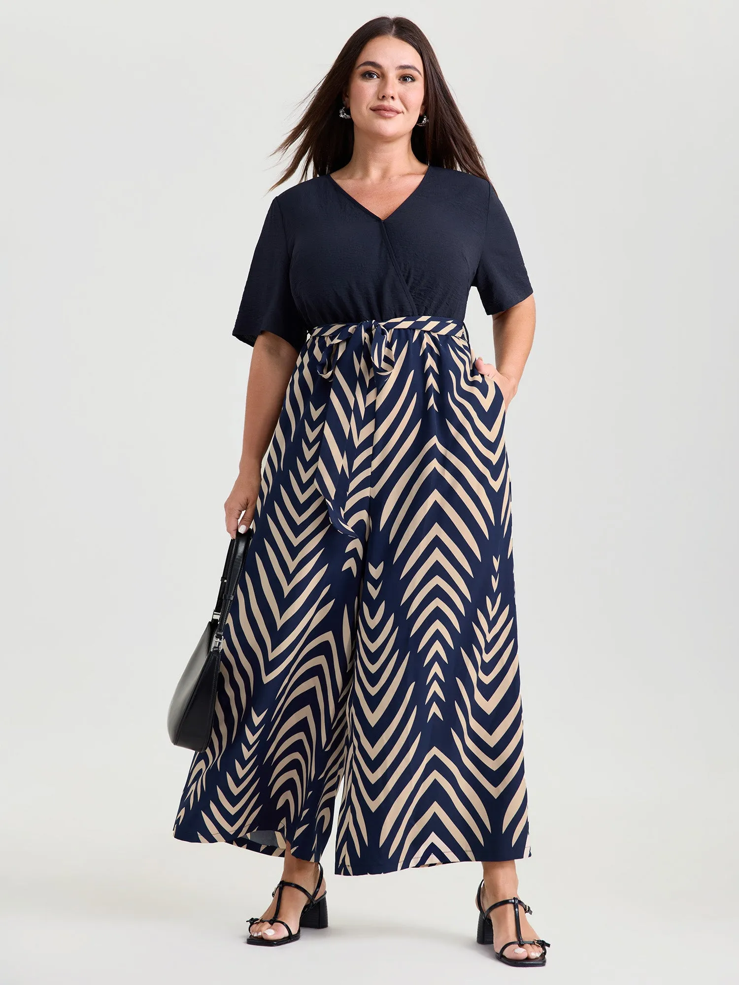 Geometric Print V-Neck Stretchy Jumpsuit sold by Bloomchic