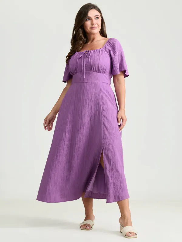 Textured Curvy Hem Bust-Friendly Slit Midi Dress made by Bloomchic