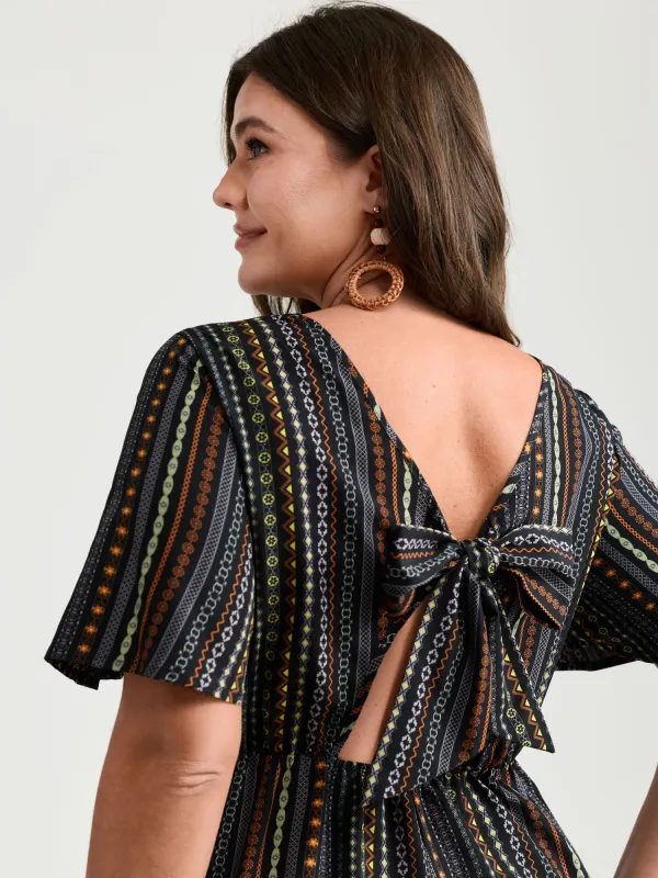 Colorful Stripes Back-Tie Cut-Out Romper sold by Bloomchic