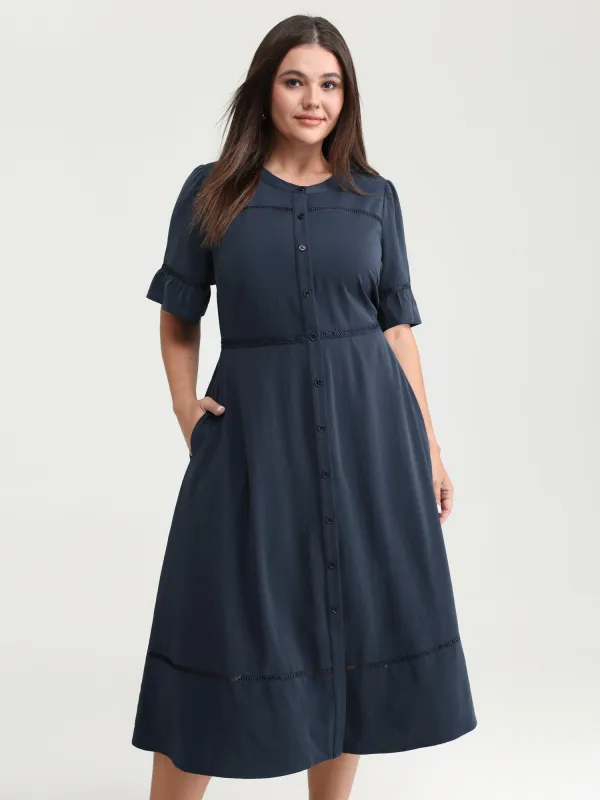 Eyelet Trim Pockets Button-Placket Midi Dress made by Bloomchic
