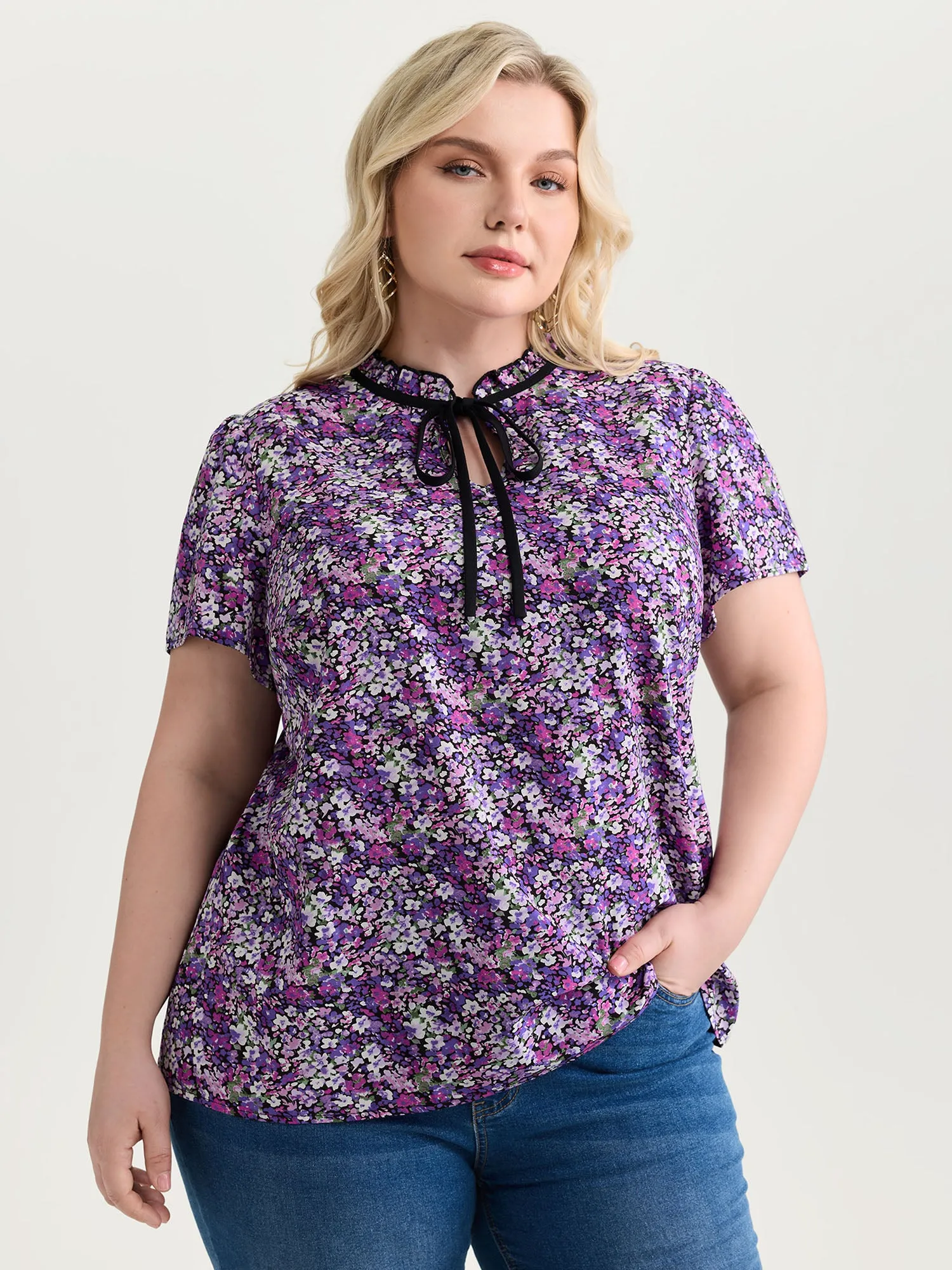 Dense Floral Print Ruffled Mock Neck Blouse sold by Bloomchic