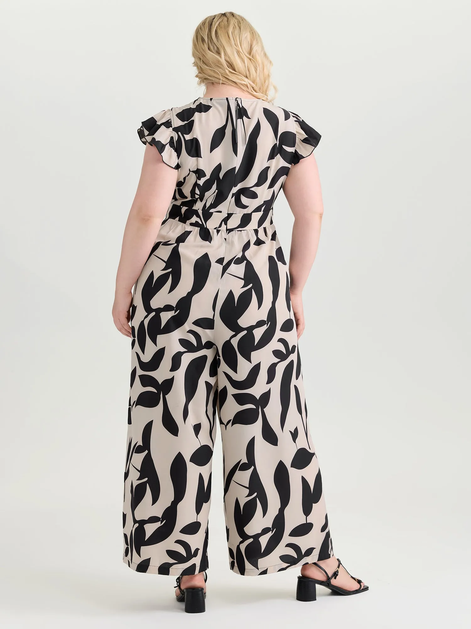 Silhouette Flower Lace Waist-Defining Jumpsuit sold by Bloomchic product image thumbnail 4