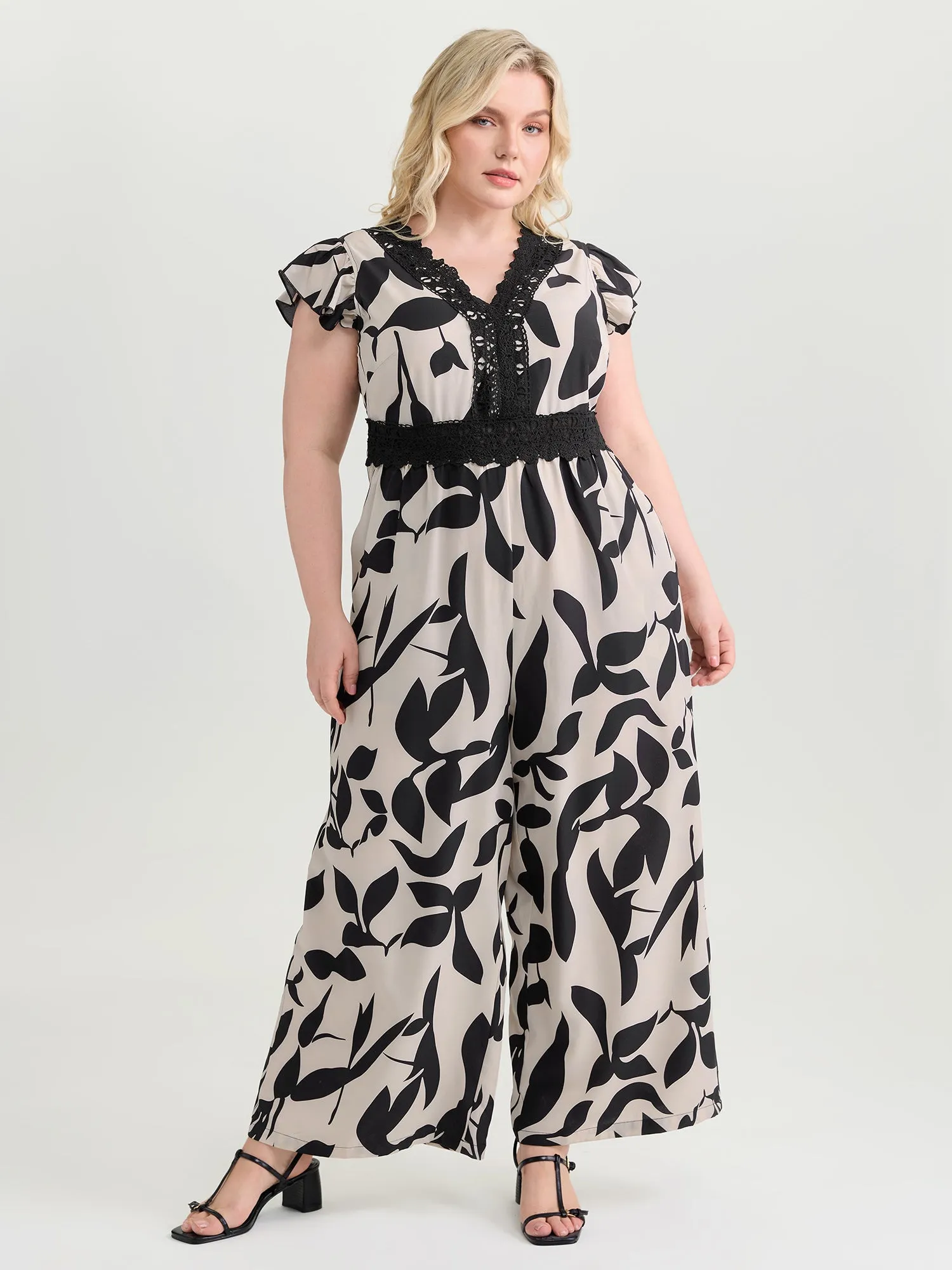 Silhouette Flower Lace Waist-Defining Jumpsuit sold by Bloomchic