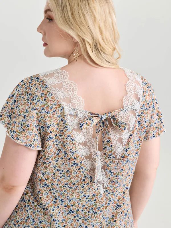 Micro Floral Print Open Back Tie Blouse made by Bloomchic