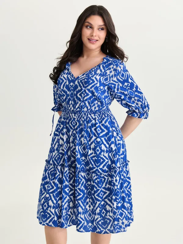 Abstract Print Drawstring Neckline Shirred Mini Dress made by Bloomchic
