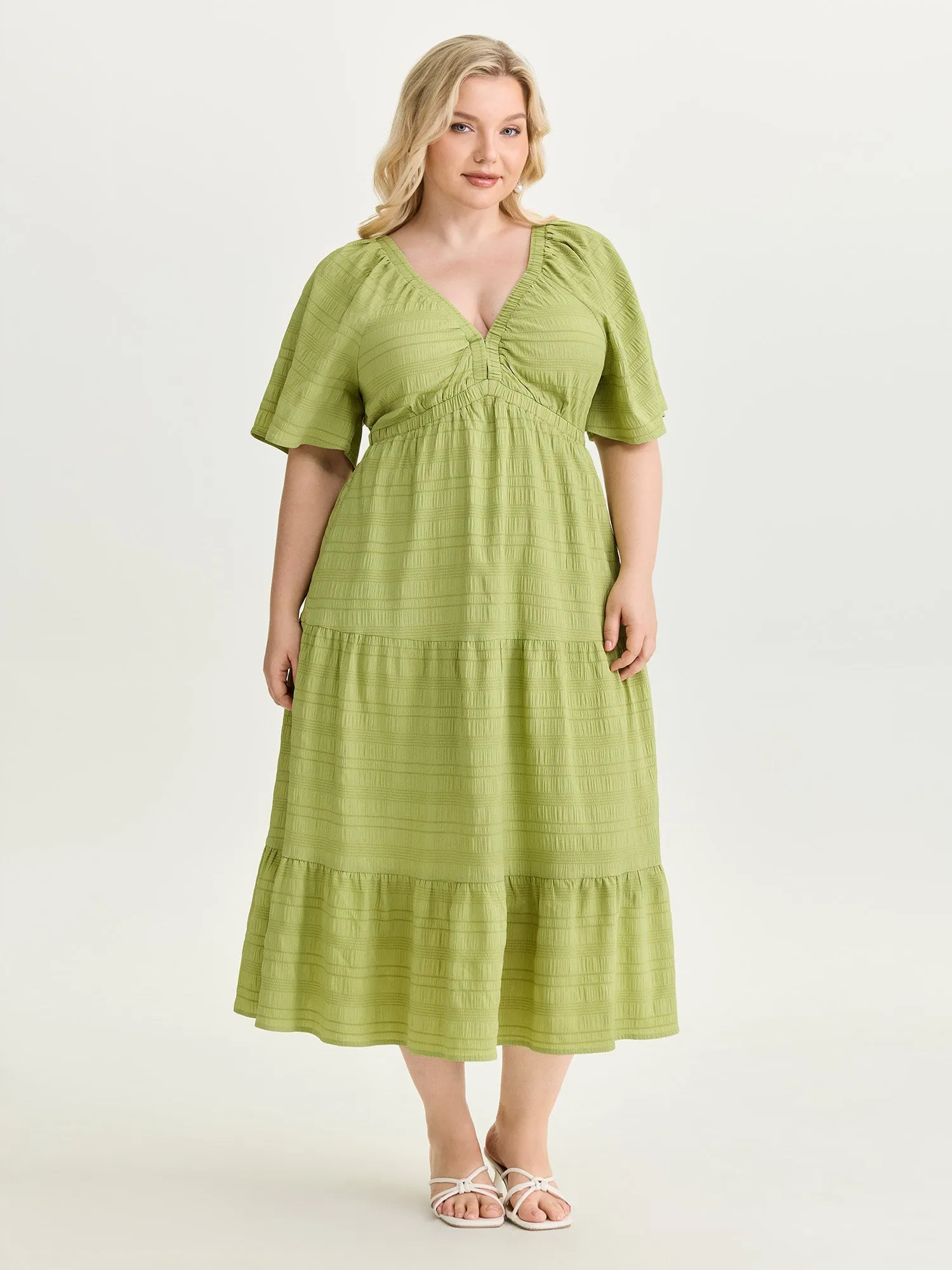 Deep V-Neckline Tiered Flowy Maxi Dress sold by Bloomchic