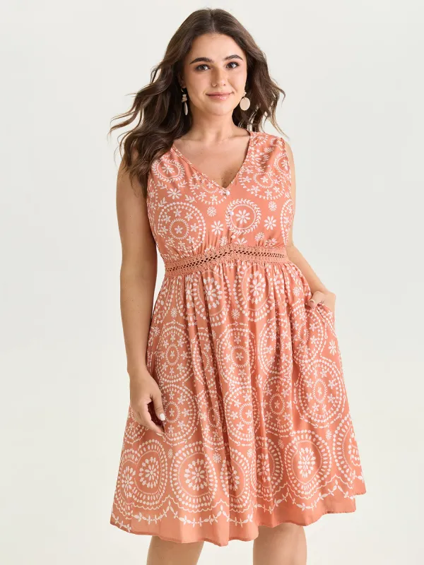 Geometric Print Deep V-Neckline Mini Dress made by Bloomchic