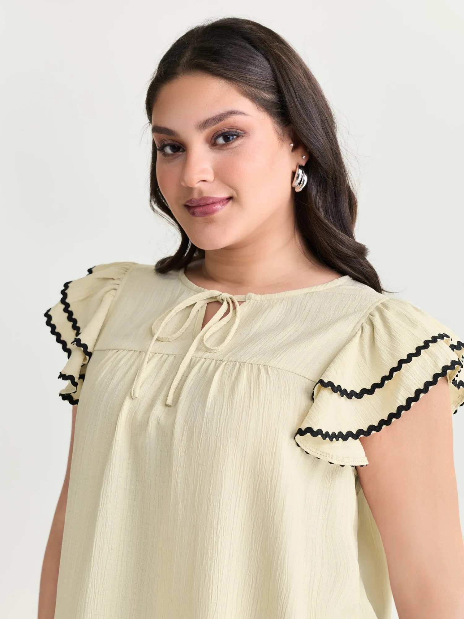 Textured Color Contrast Layered Sleeve Blouse sold by Bloomchic product image thumbnail 2