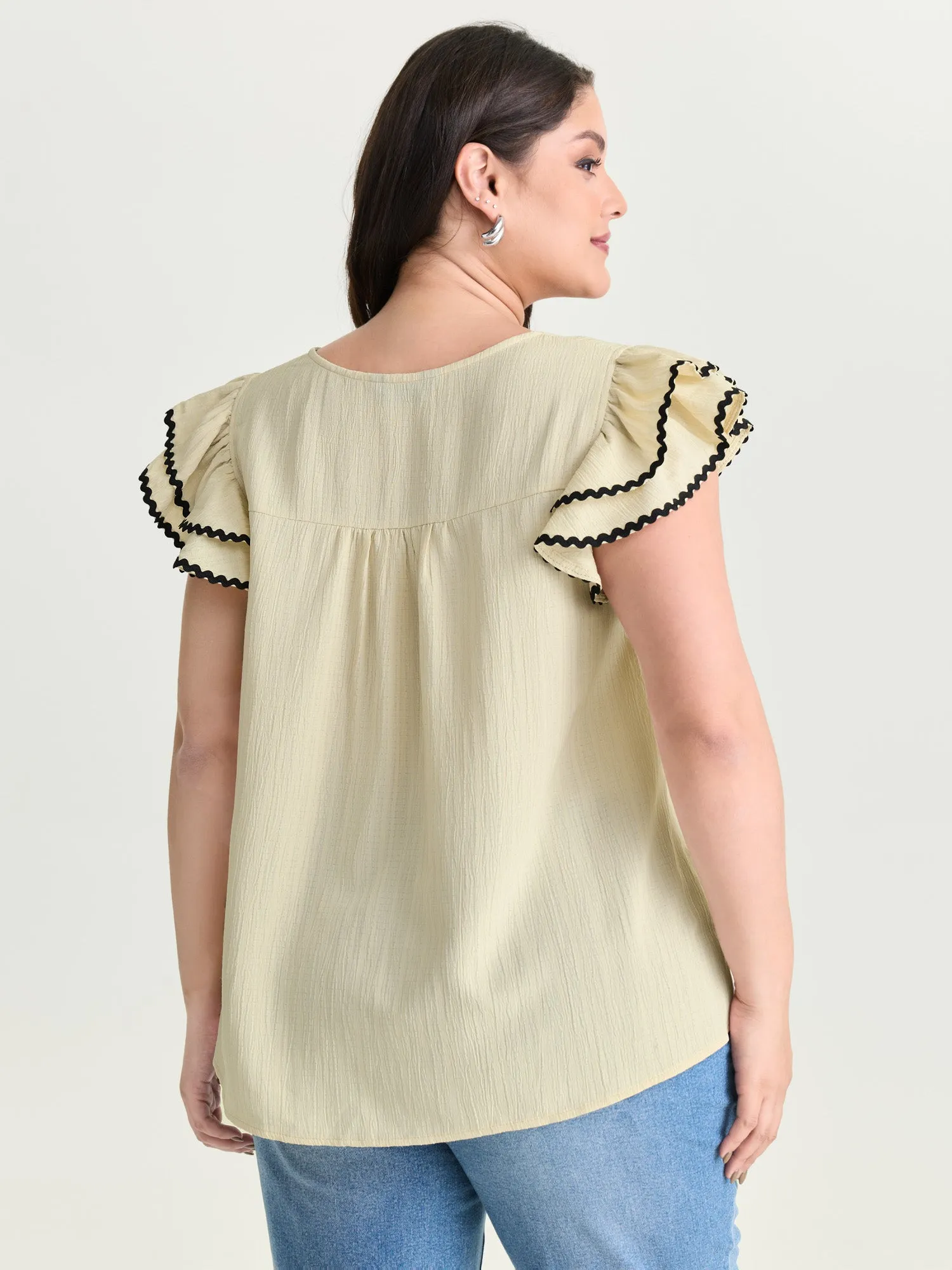 Textured Color Contrast Layered Sleeve Blouse sold by Bloomchic product image thumbnail 4