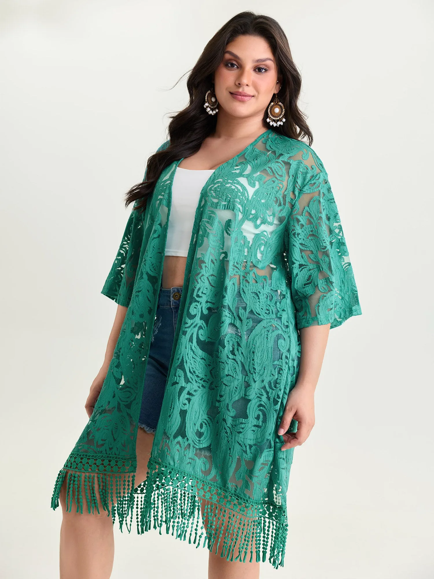 Laser Cut Floral Textured Tassel Detail Kimono sold by Bloomchic