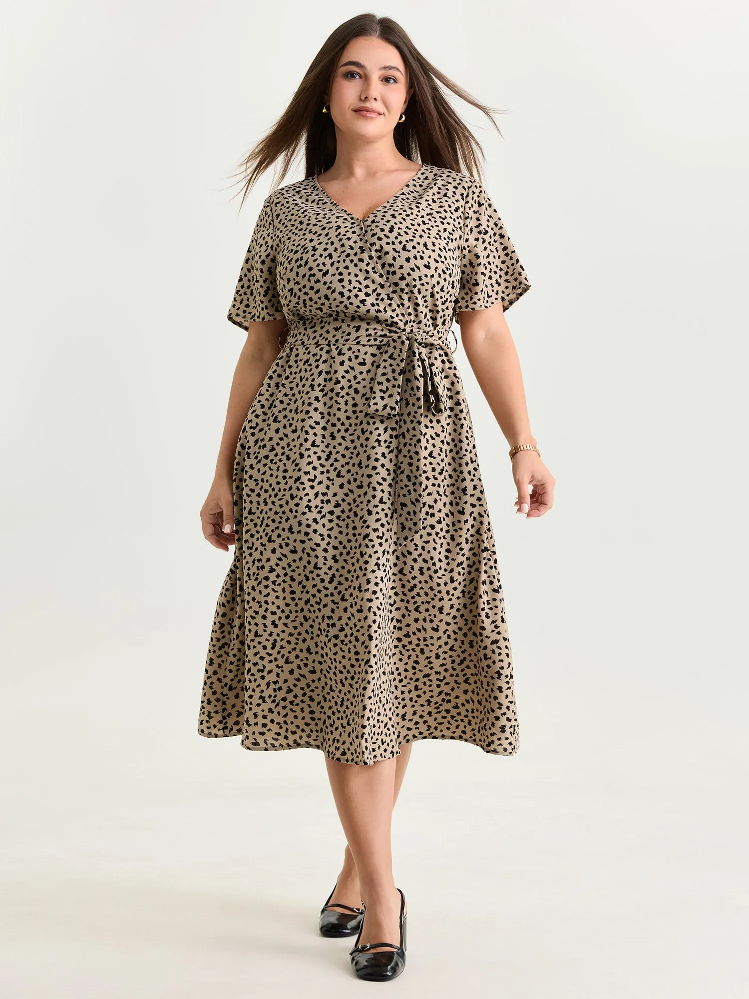 Leopard Print Side-Tie Midi Dress sold by Bloomchic