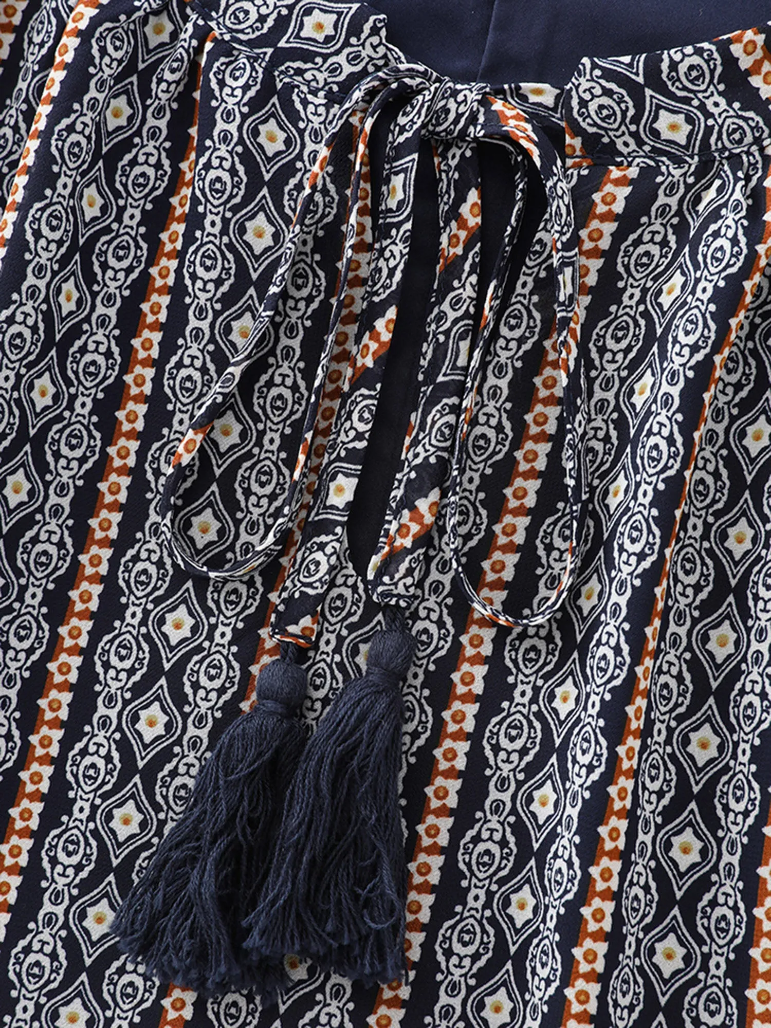 Geometric Print Flutter Sleeve Tassels Blouse sold by Bloomchic product image thumbnail 5