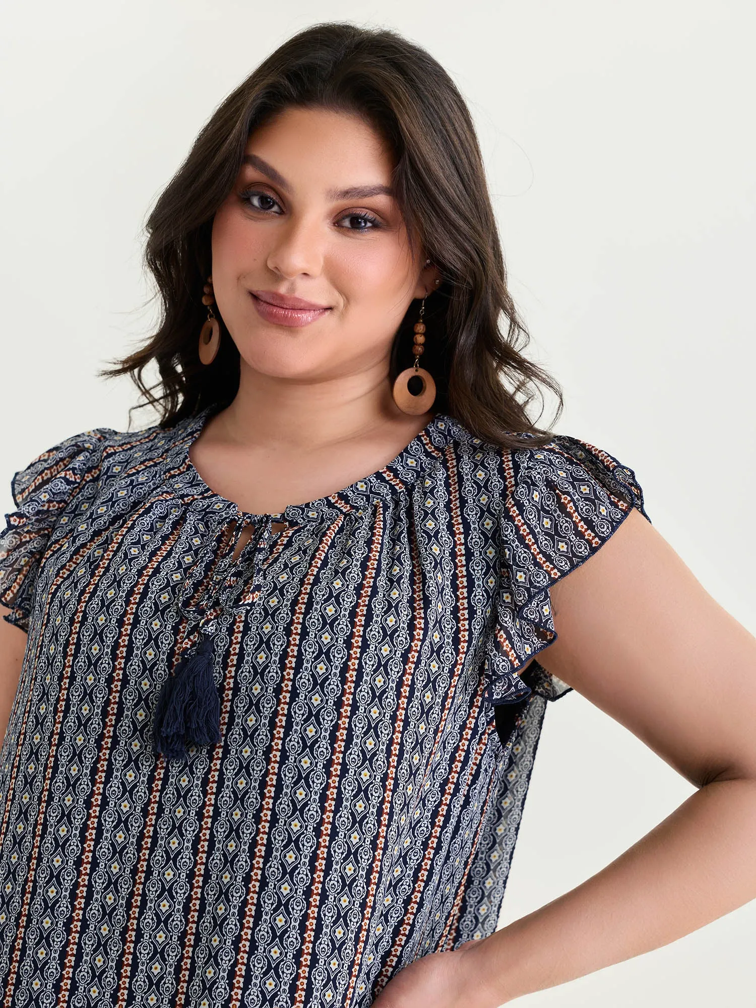 Geometric Print Flutter Sleeve Tassels Blouse sold by Bloomchic product image thumbnail 2