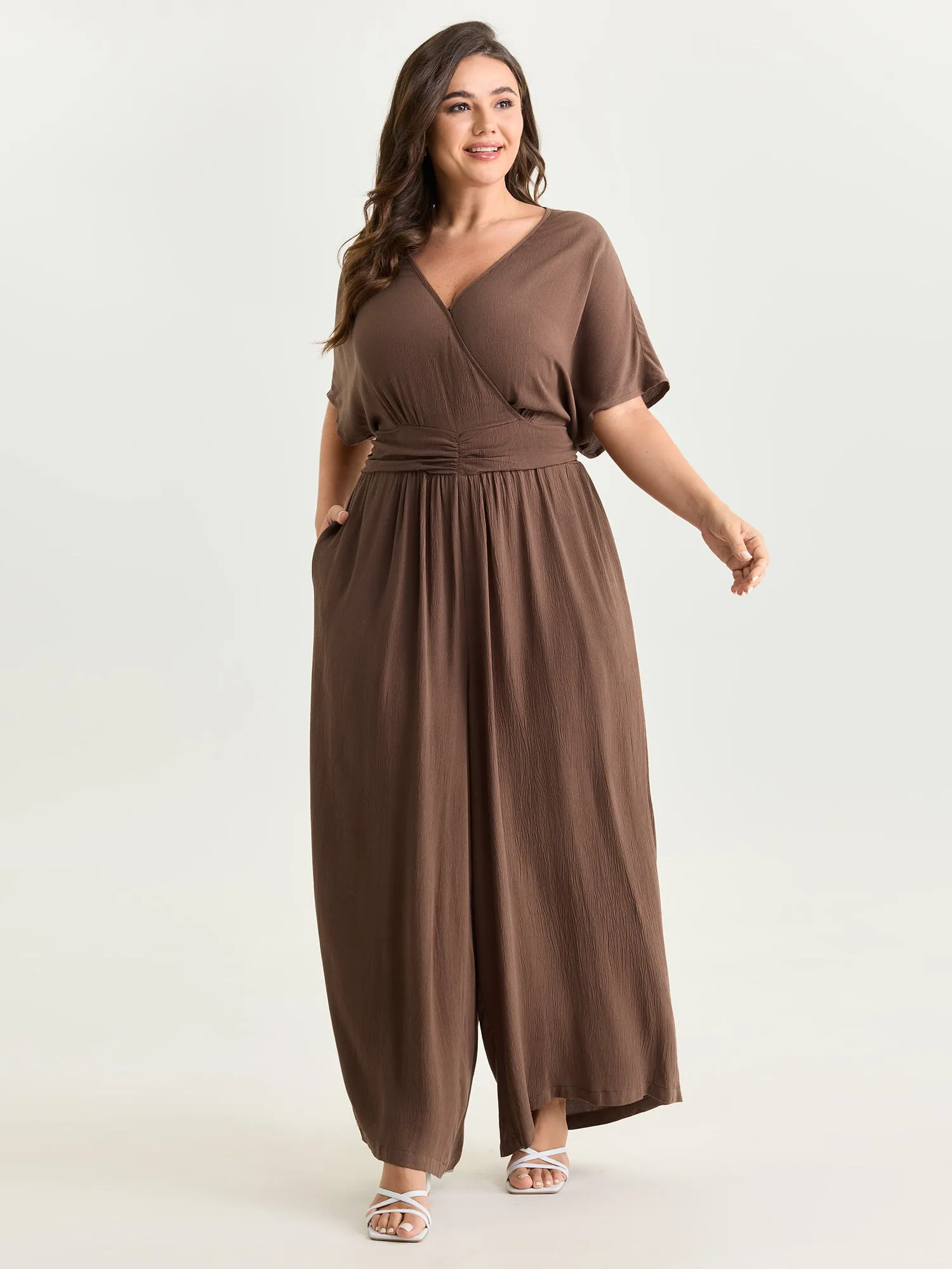Textured Pleated Waist Surplice Jumpsuit sold by Bloomchic product image thumbnail 3