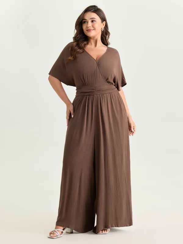 Textured Pleated Waist Surplice Jumpsuit made by Bloomchic