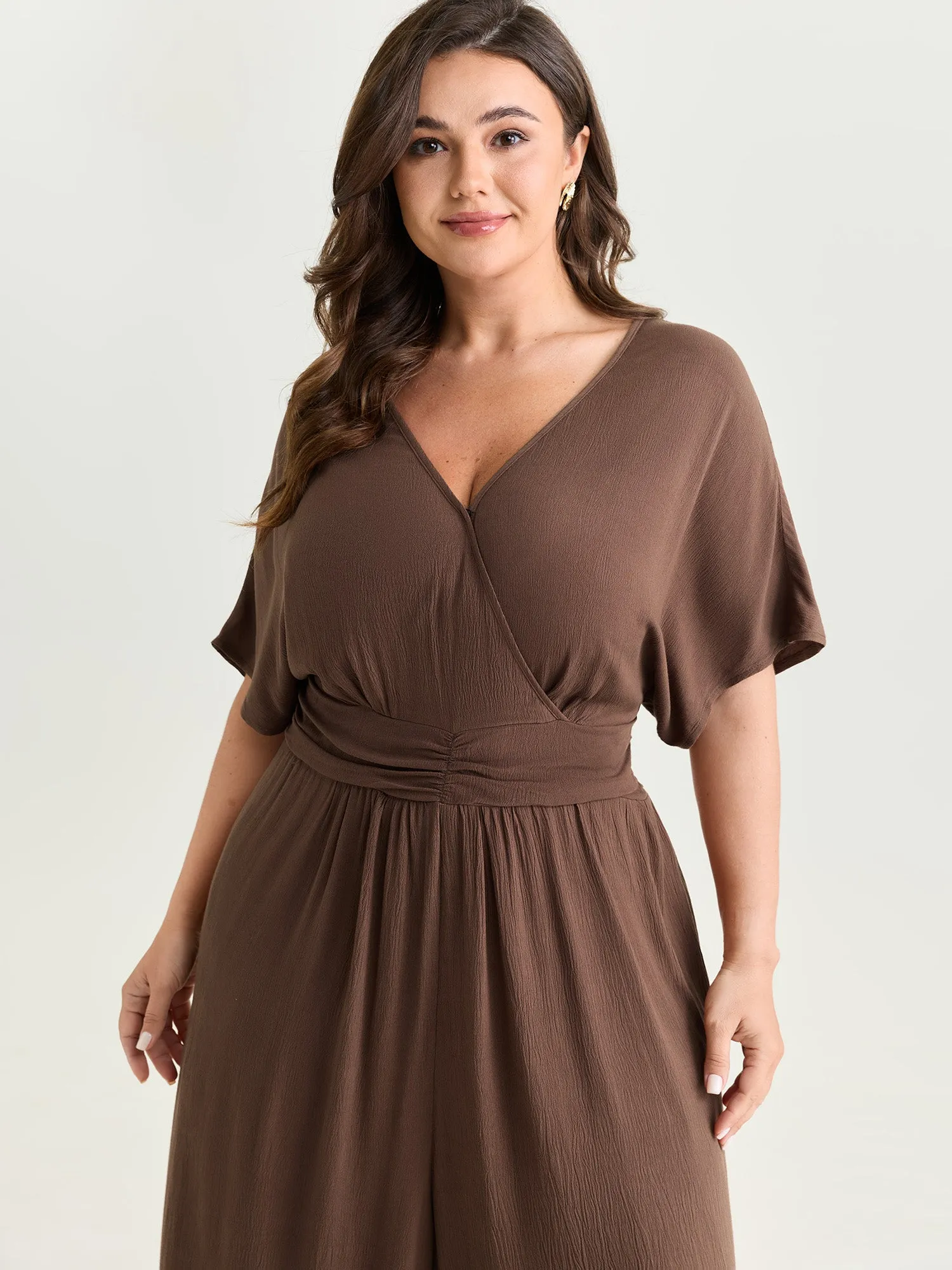 Textured Pleated Waist Surplice Jumpsuit sold by Bloomchic product image thumbnail 2