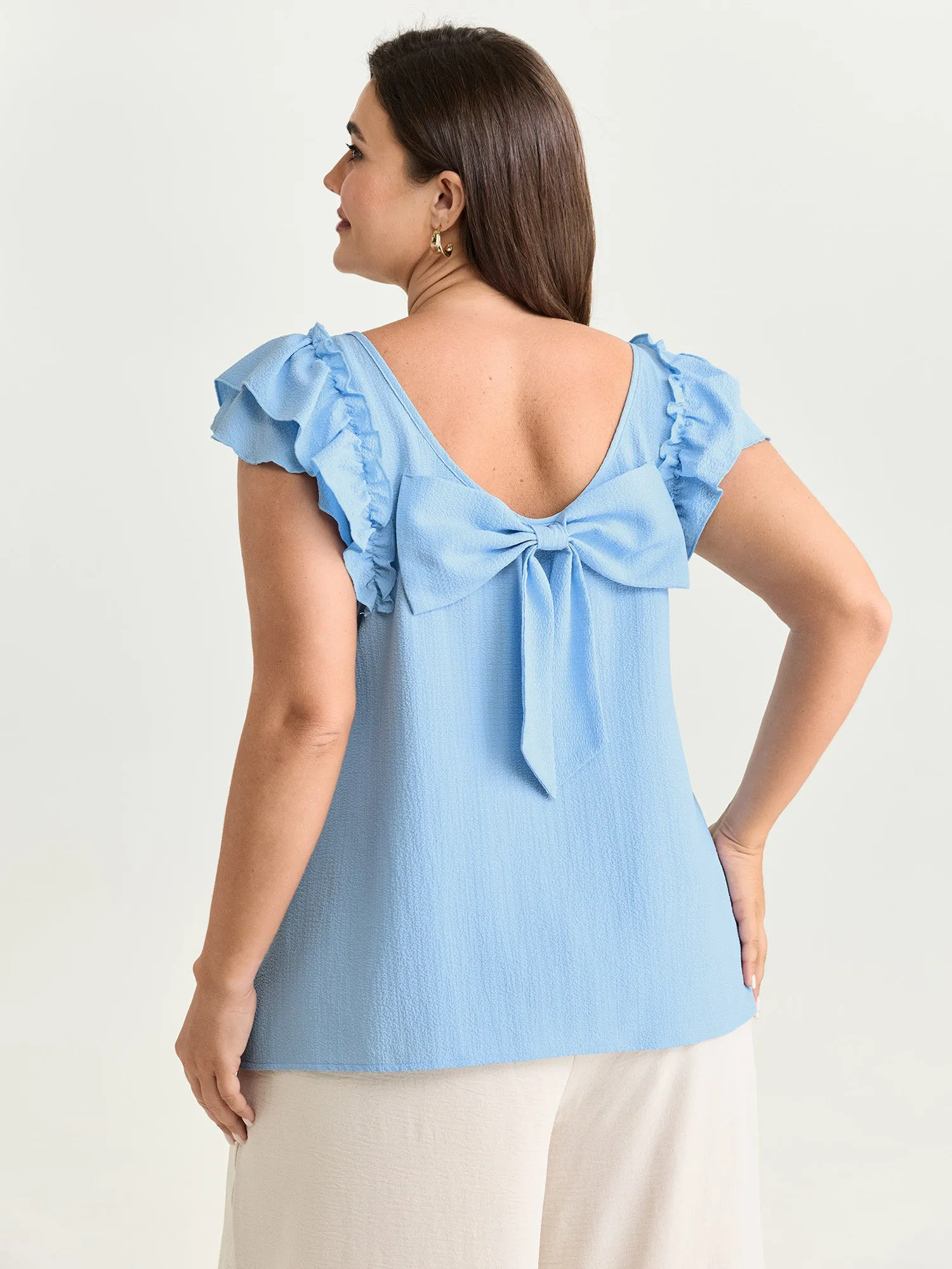 Textured Layered Flutter Sleeve Bowknot Blouse sold by Bloomchic product image thumbnail 5