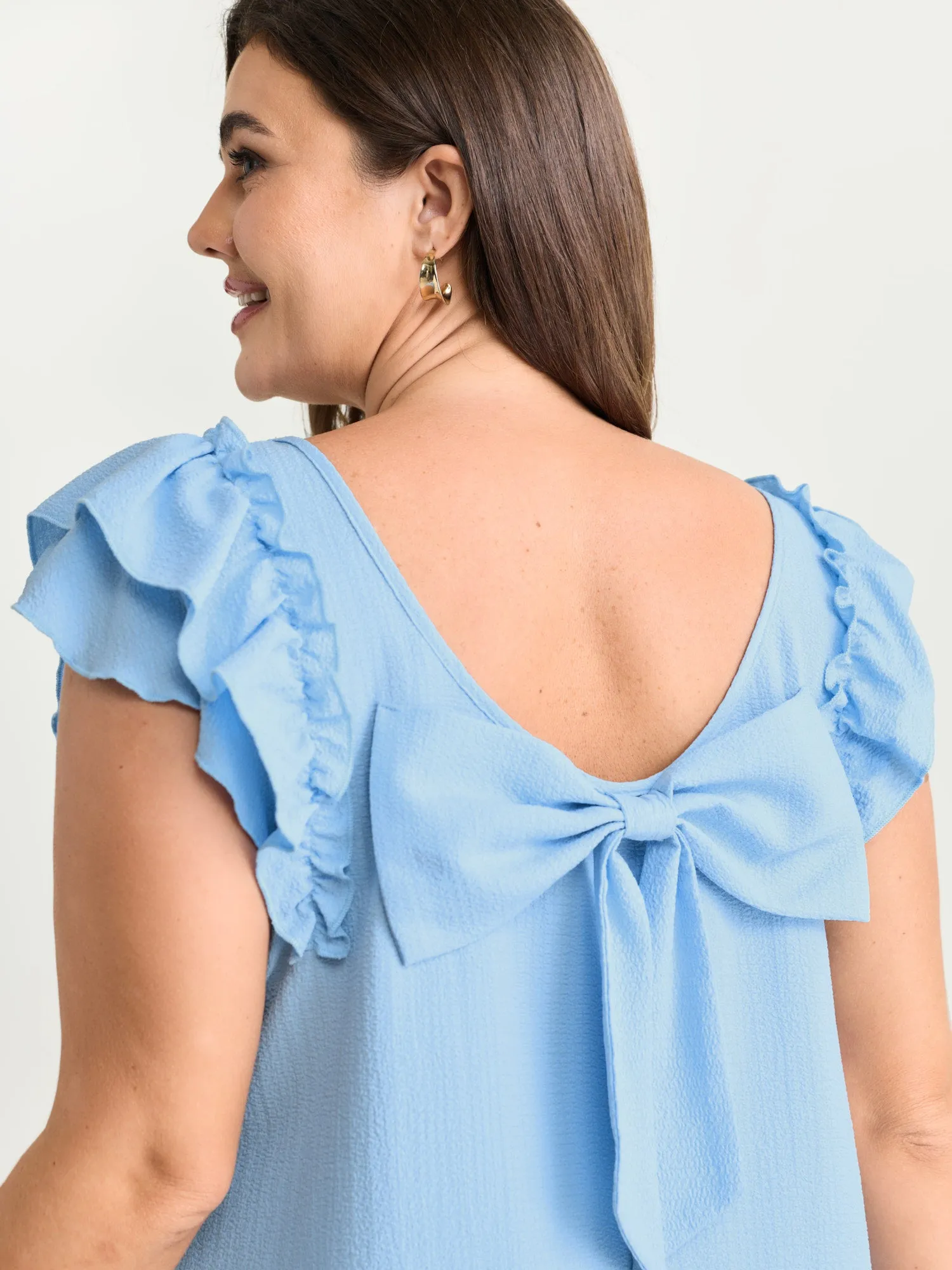 Textured Layered Flutter Sleeve Bowknot Blouse sold by Bloomchic