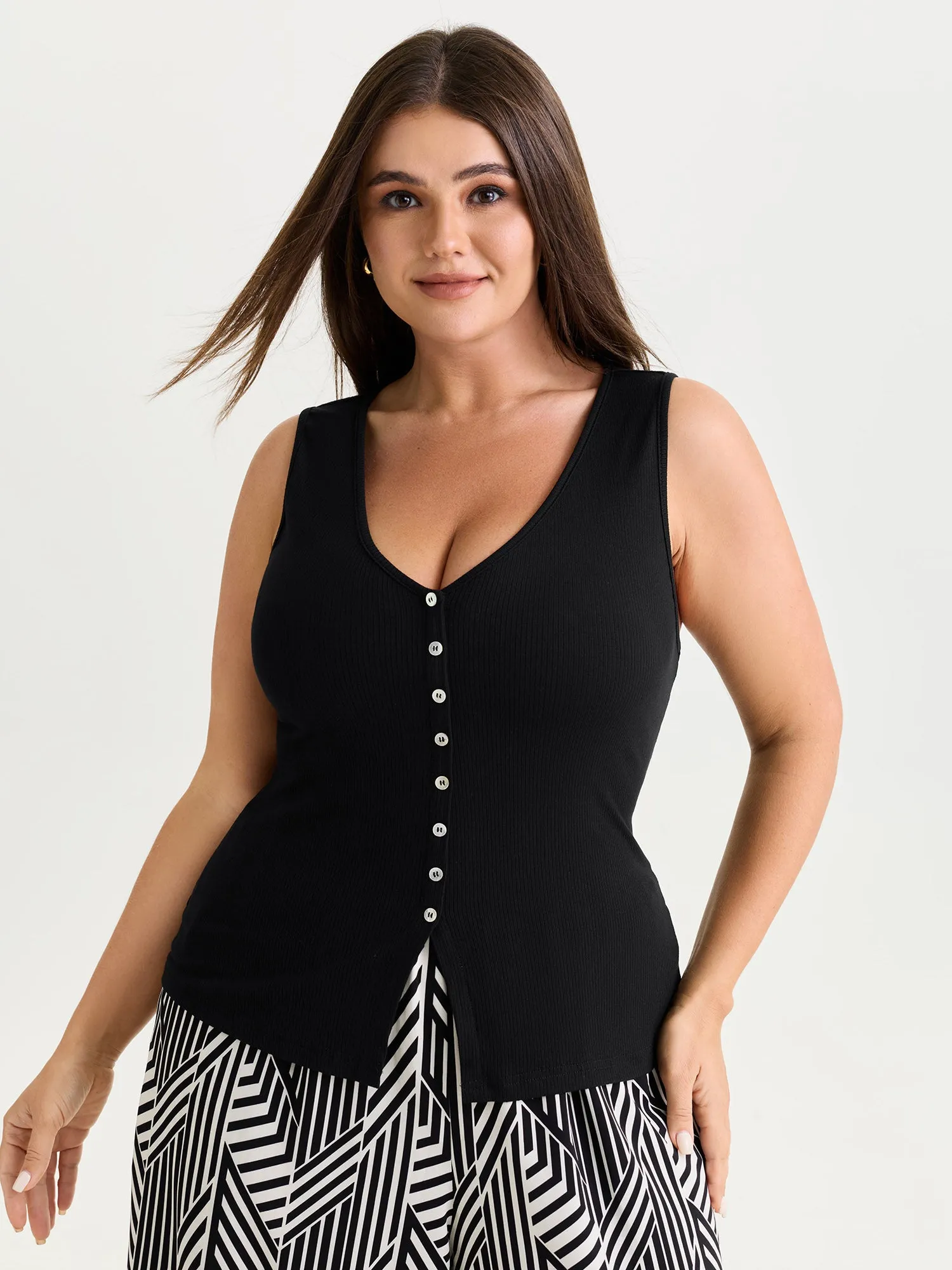 Stretchy Button-Front Tunic Style Top sold by Bloomchic