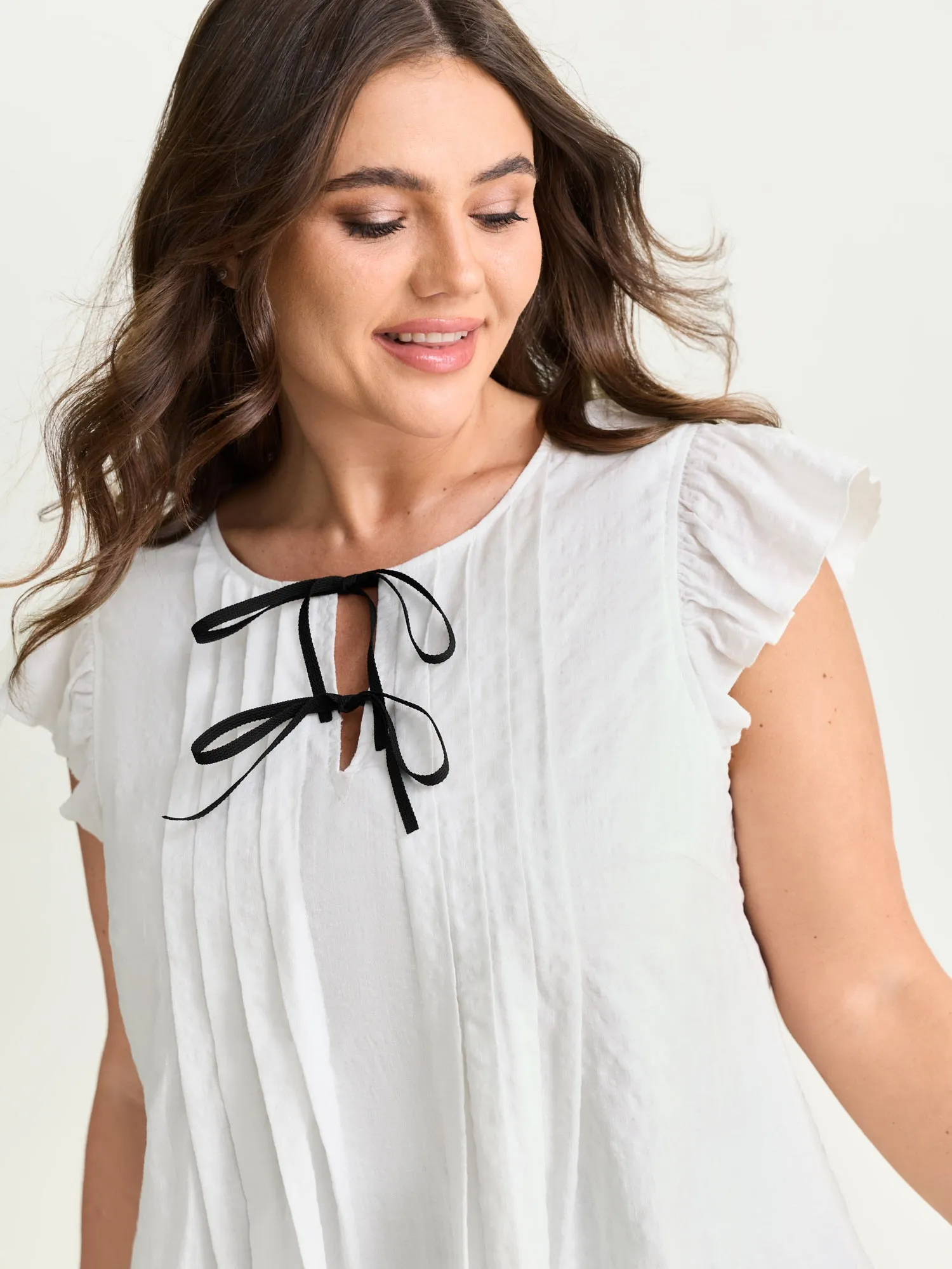 Cotton Flutter Sleeve Pleated Contrast Bows Blouse sold by Bloomchic product image thumbnail 2