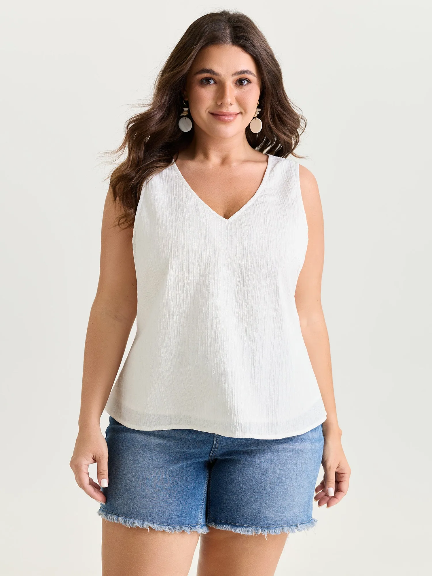 Lace Textured Sleeveless Blouse sold by Bloomchic
