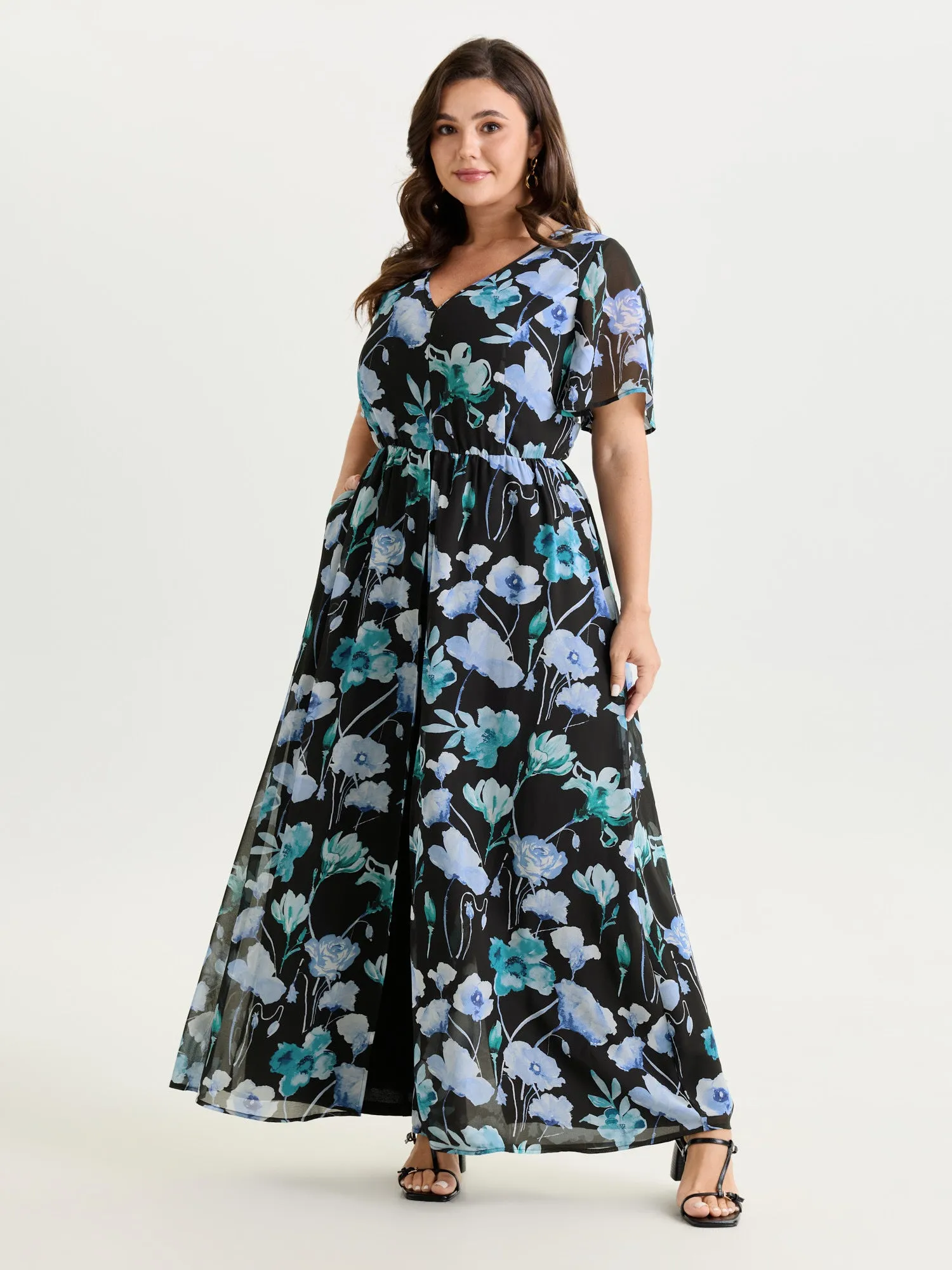 Hidden Zipper Floral Layered Pockets Jumpsuit sold by Bloomchic