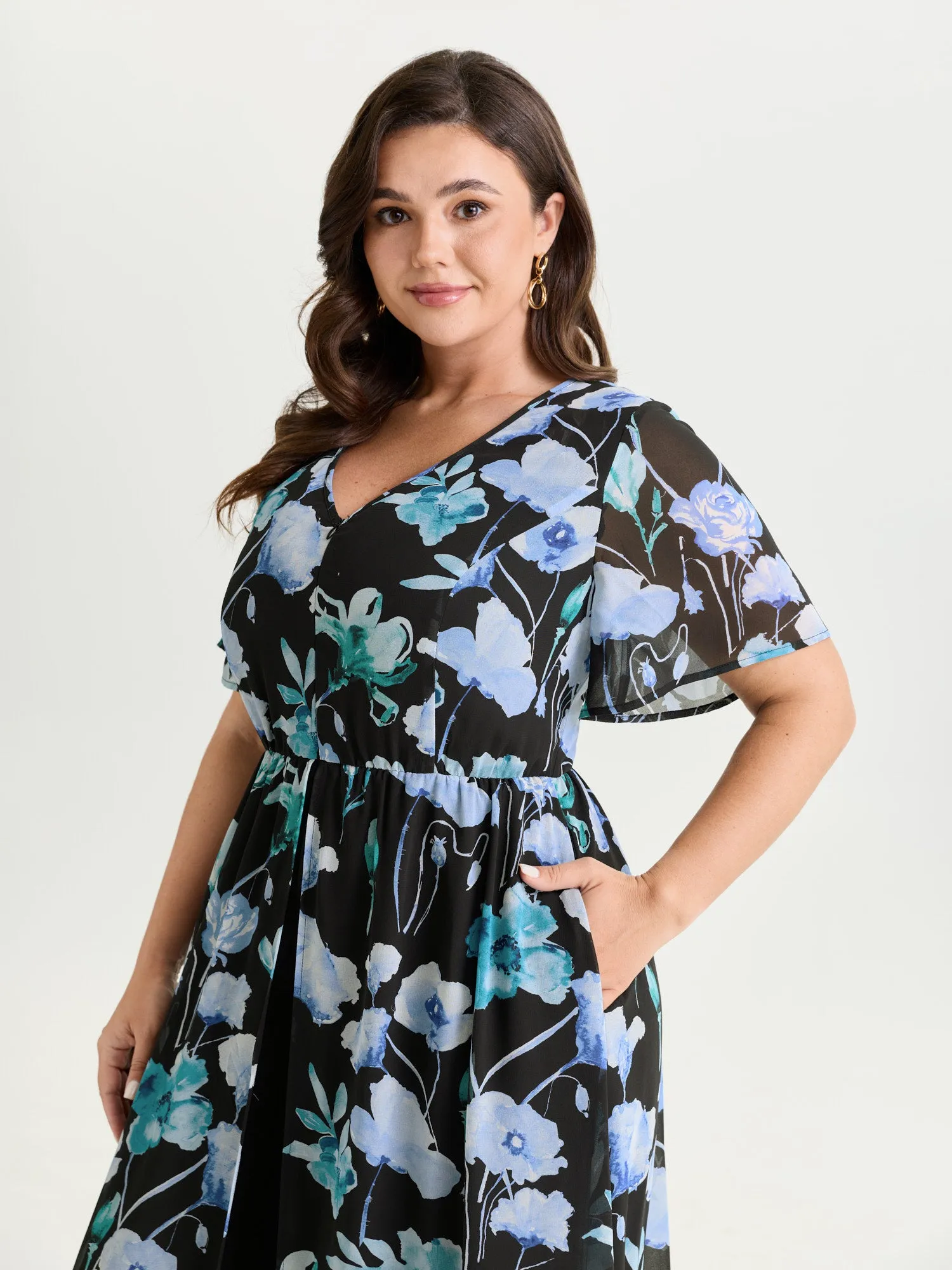 Hidden Zipper Floral Layered Pockets Jumpsuit sold by Bloomchic product image thumbnail 2
