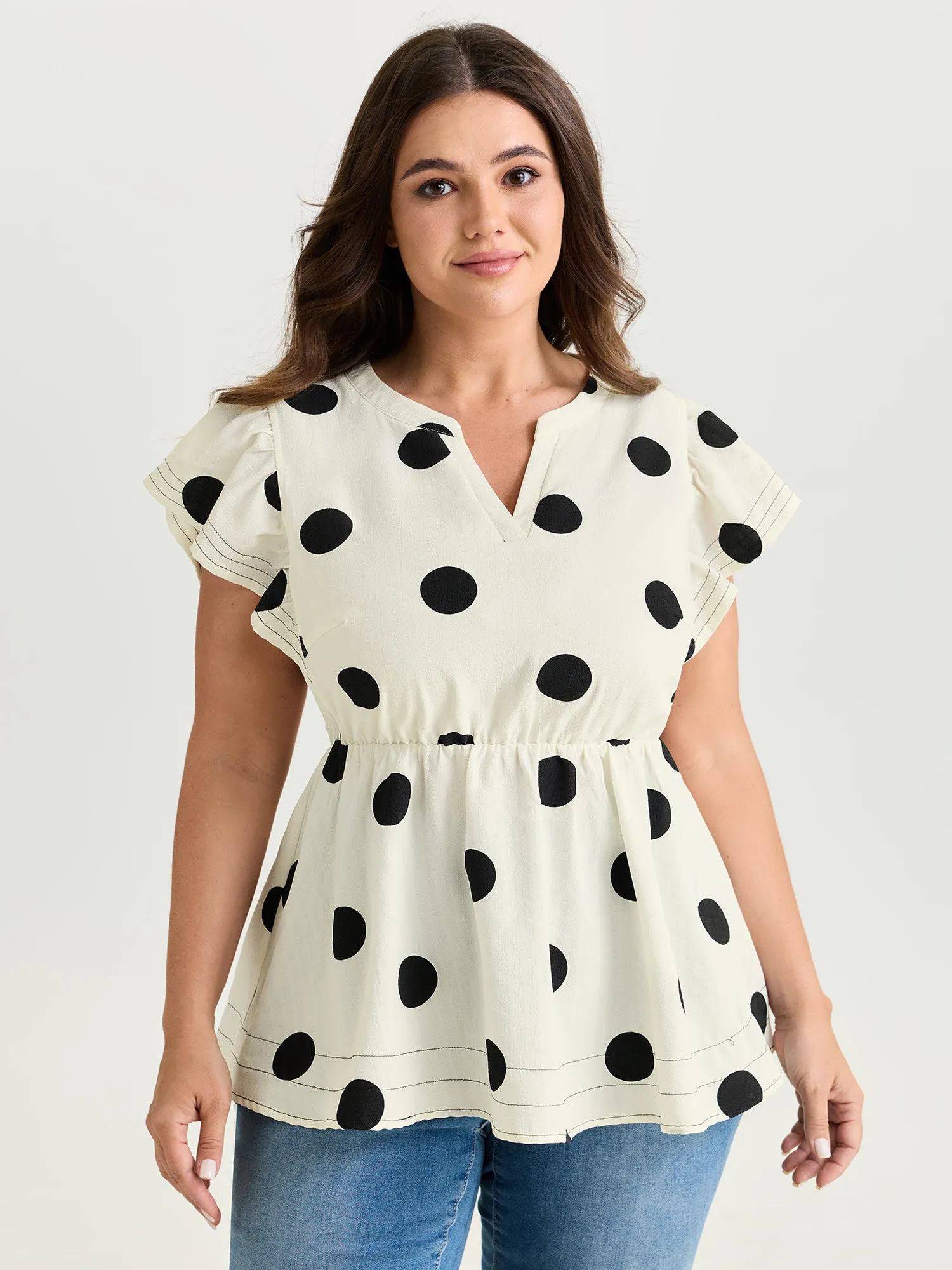 Polka Dots Ruffled Sleeve Flowy Blouse sold by Bloomchic