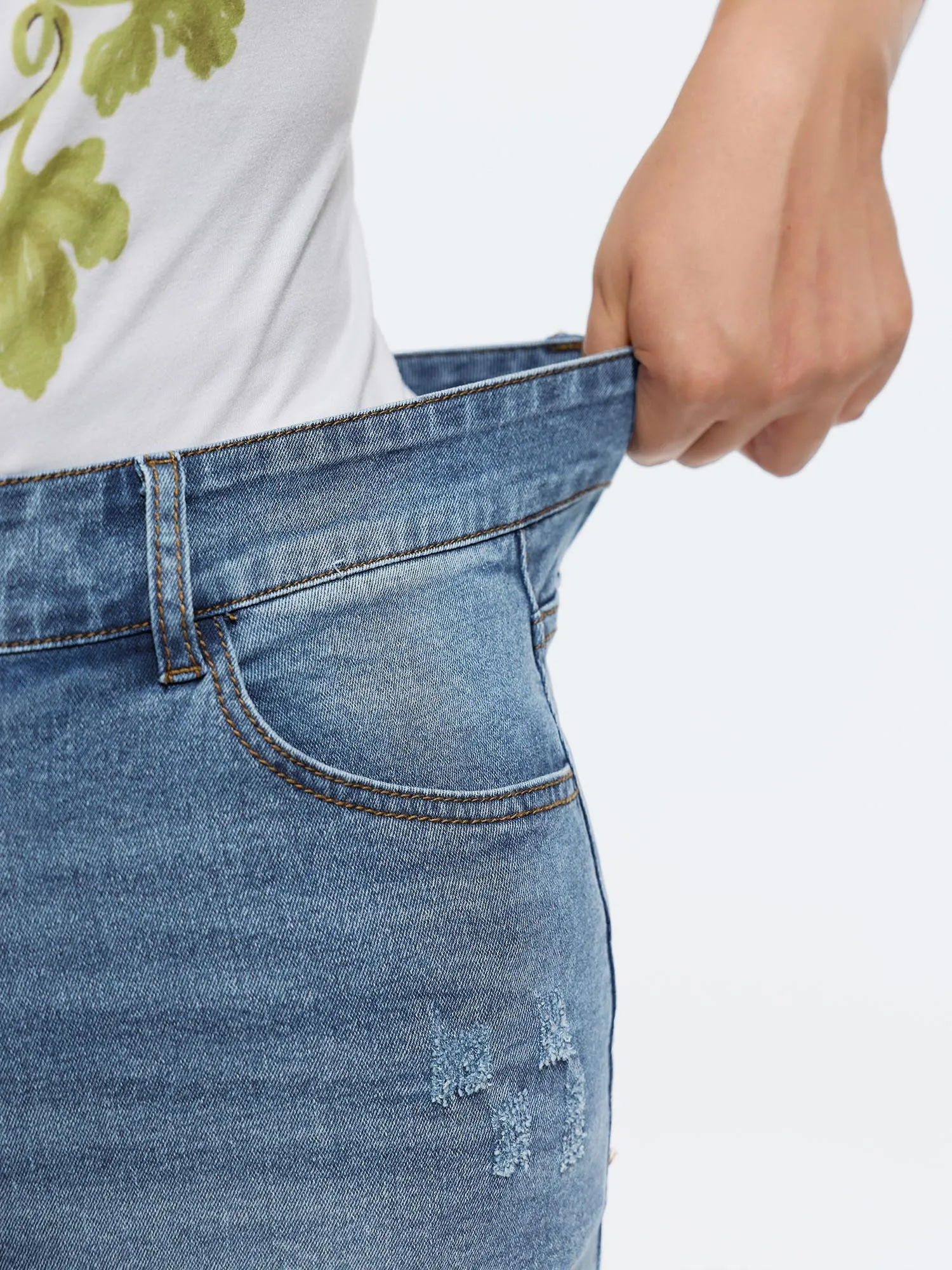 Stretchy Mid-Rise Raw Hem Denim Shorts sold by Bloomchic product image thumbnail 4