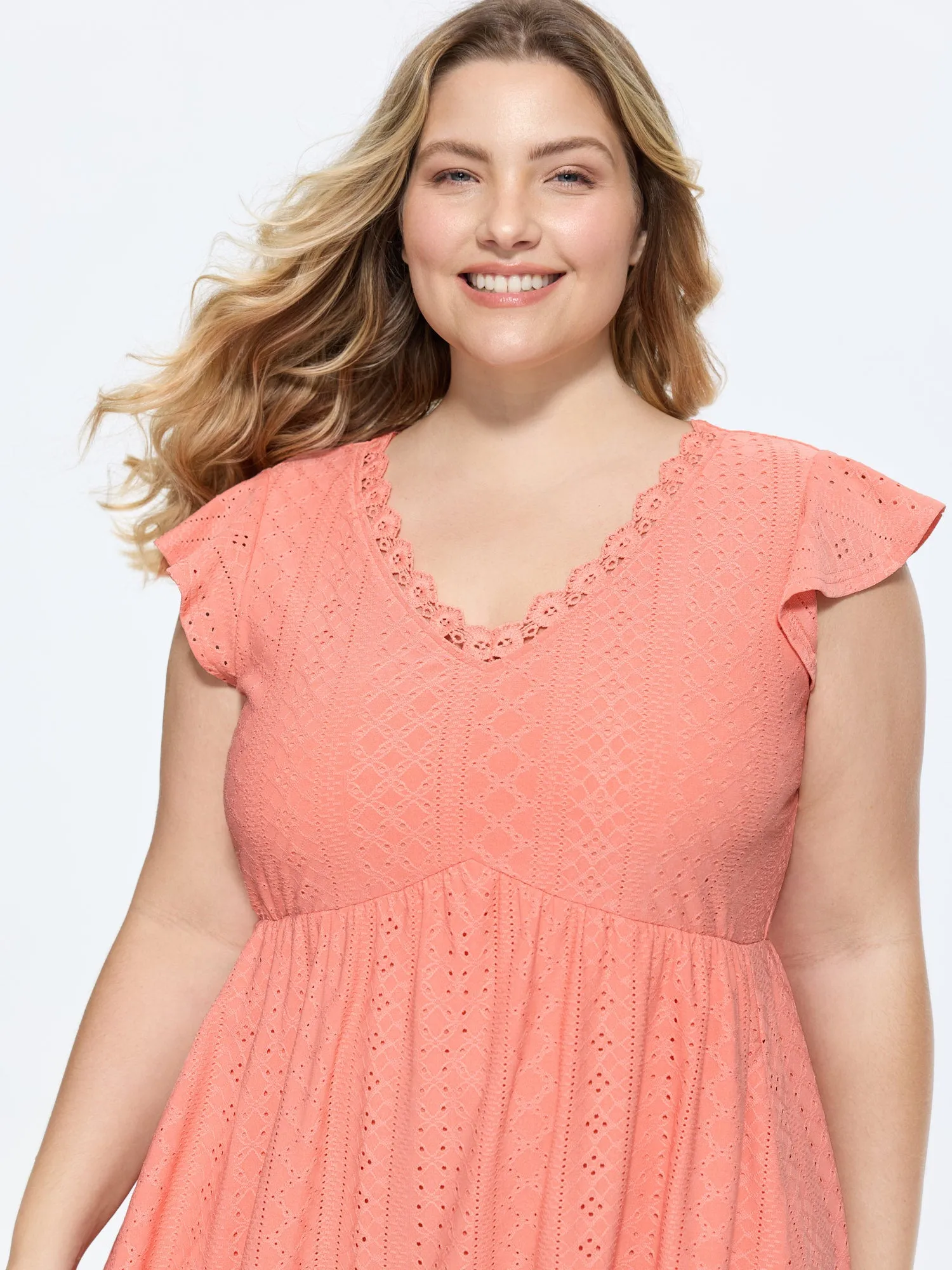Eyelet Textured Flutter Sleeve Mini Dress sold by Bloomchic product image thumbnail 2
