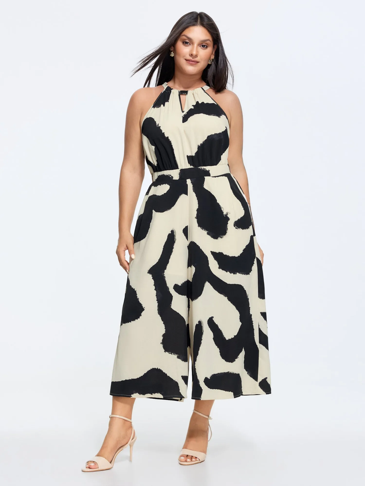 Abstract Floral Print Halter Neckline Jumpsuit sold by Bloomchic