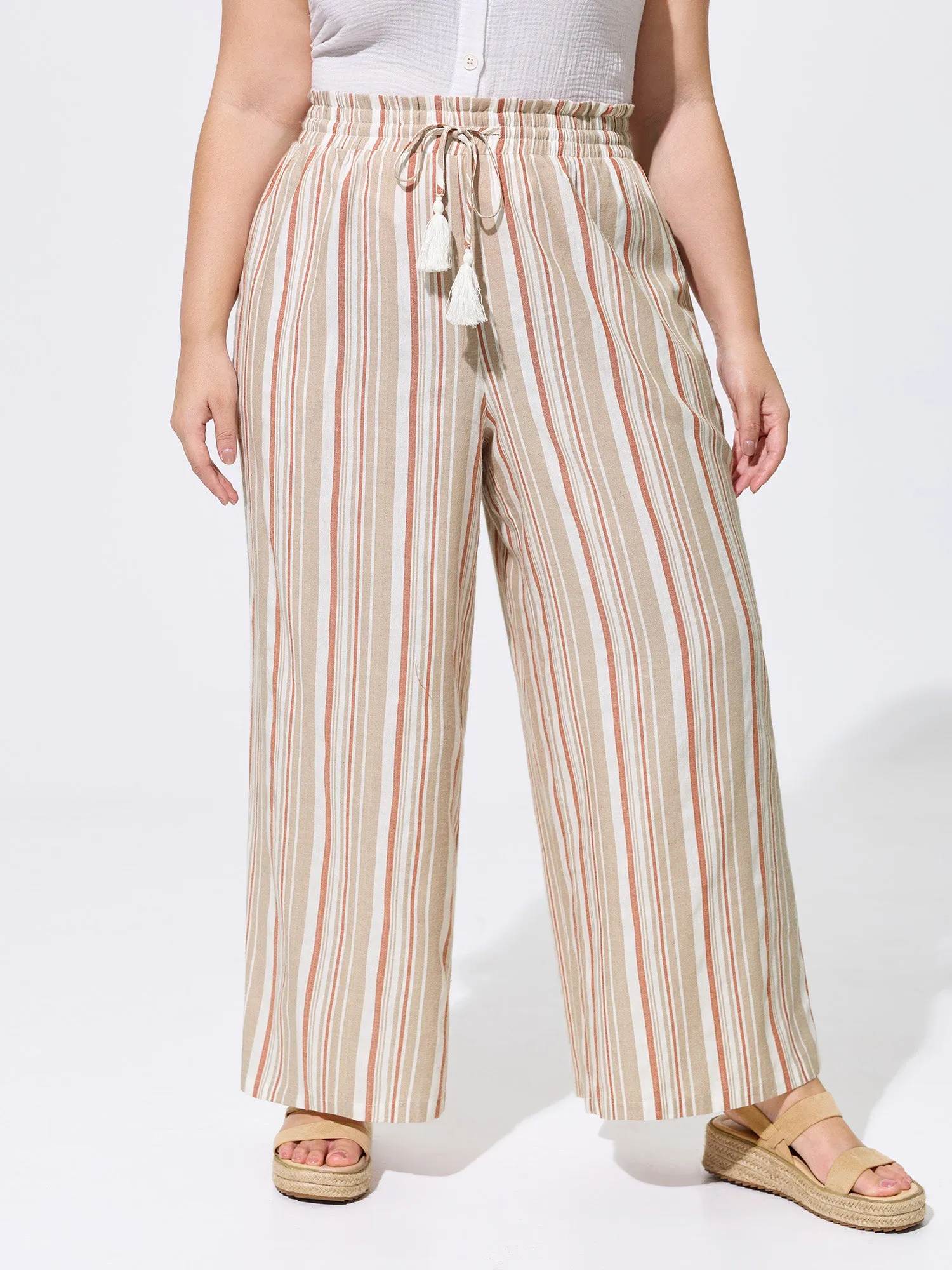 Striped Print Pockets Drawstring Pants sold by Bloomchic