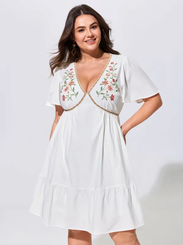 Floral Embroidered V-Neck Ruffled Hem Mini Dress made by Bloomchic