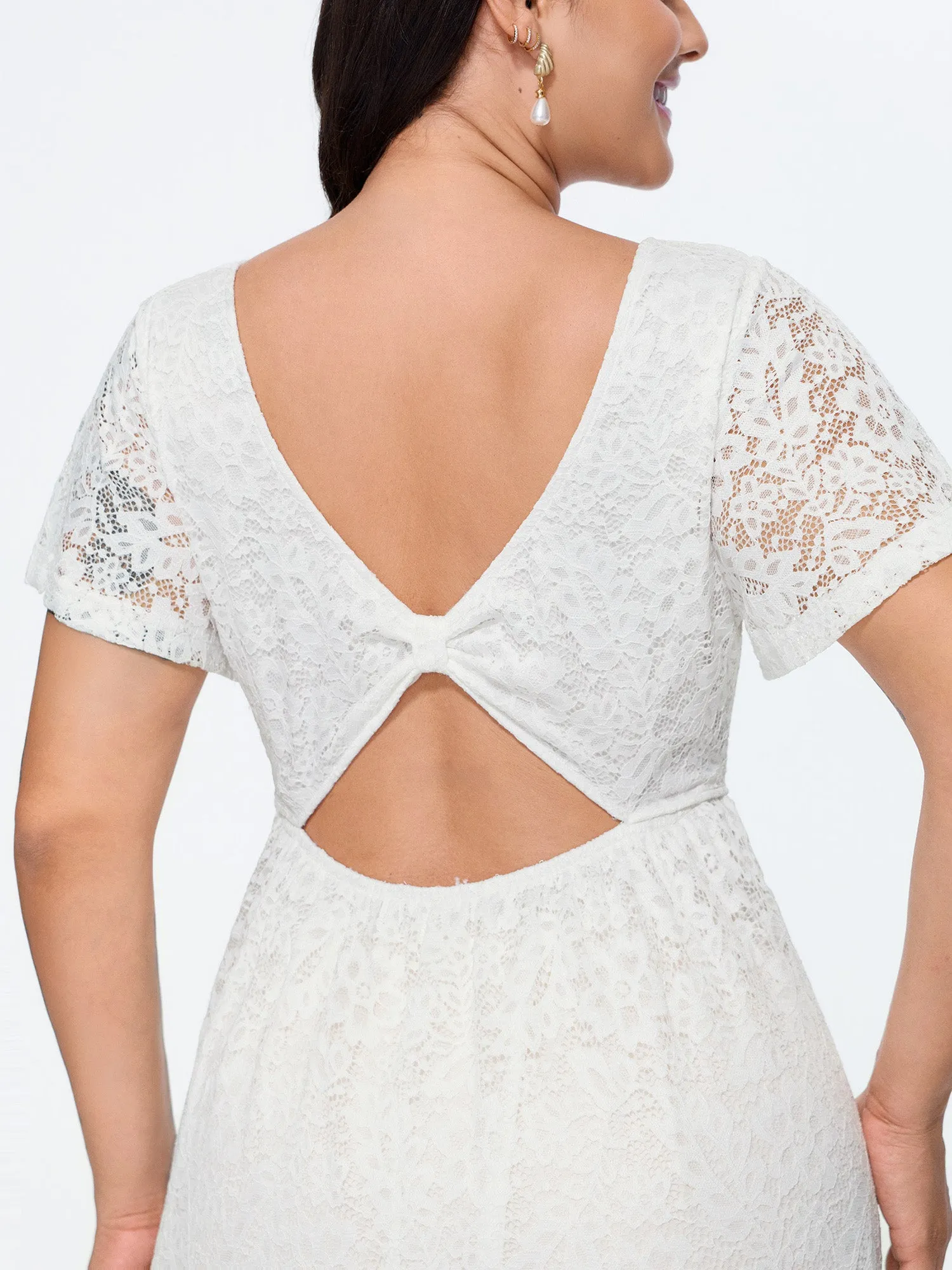 Floral Lace Textured Cut-Out Back Midi Dress sold by Bloomchic