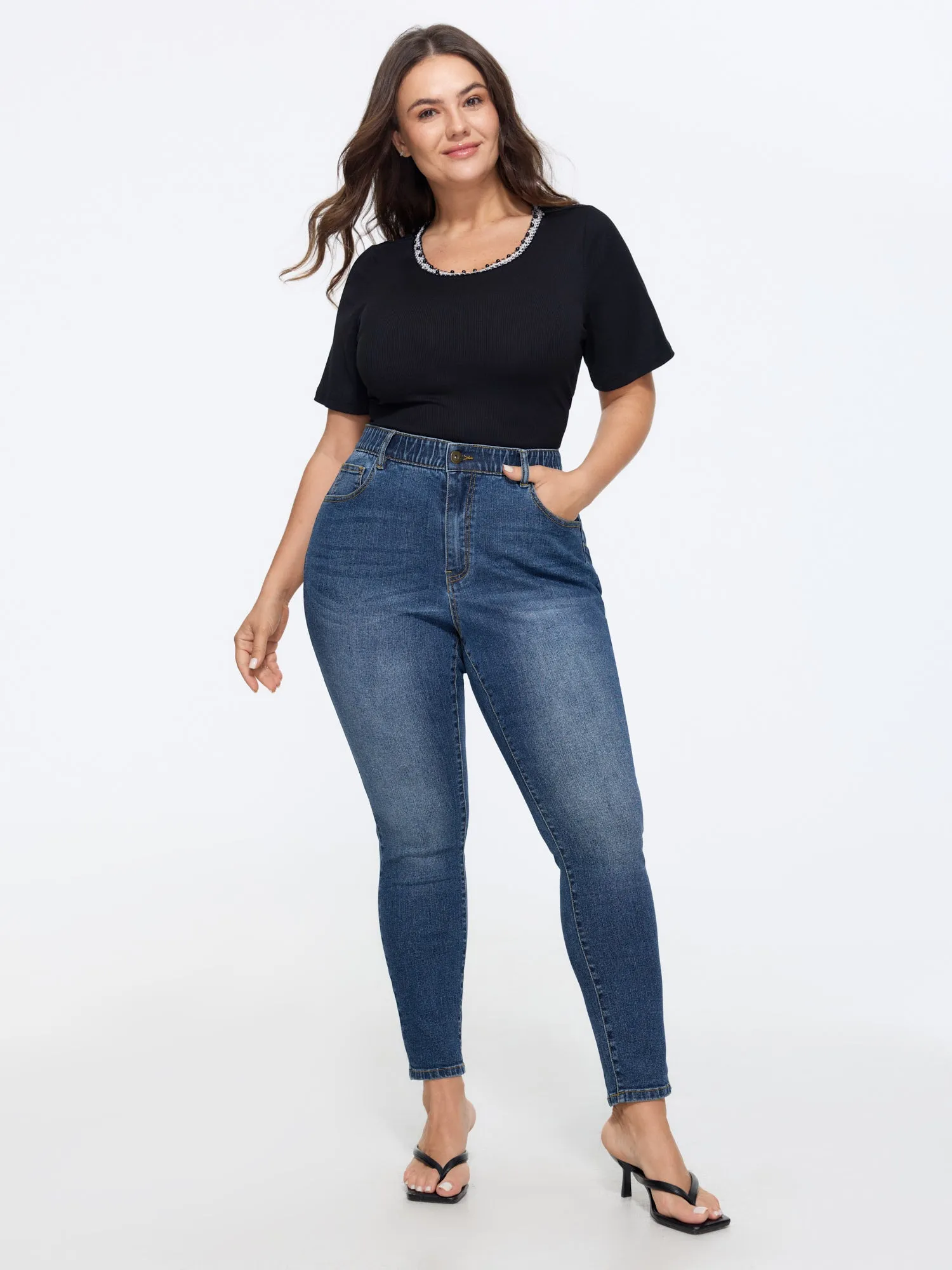Stretchy Skinny-Fit Mid-Rise Jeans sold by Bloomchic