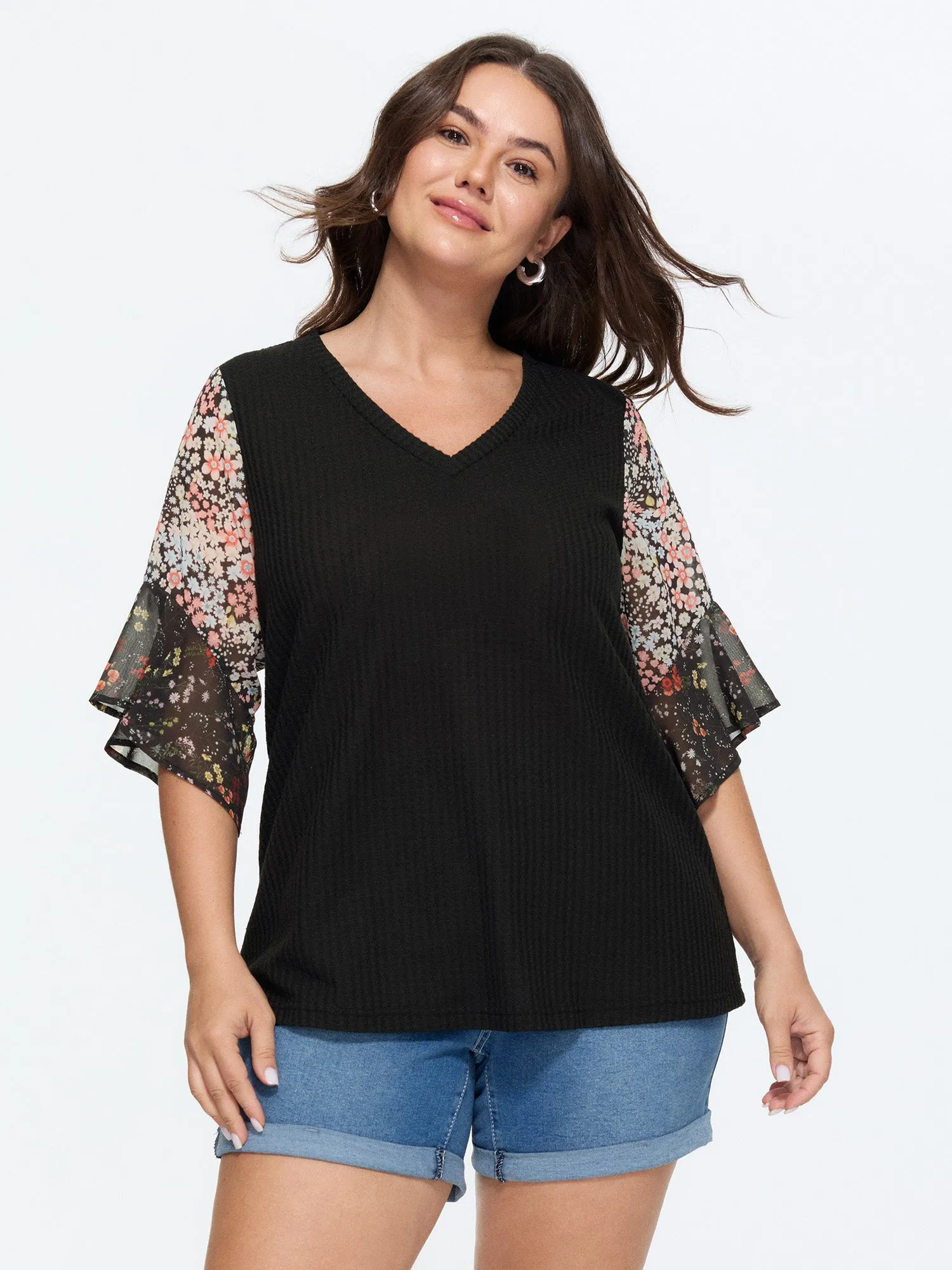 Stretchy Floral Print Ruffled Knit Top sold by Bloomchic