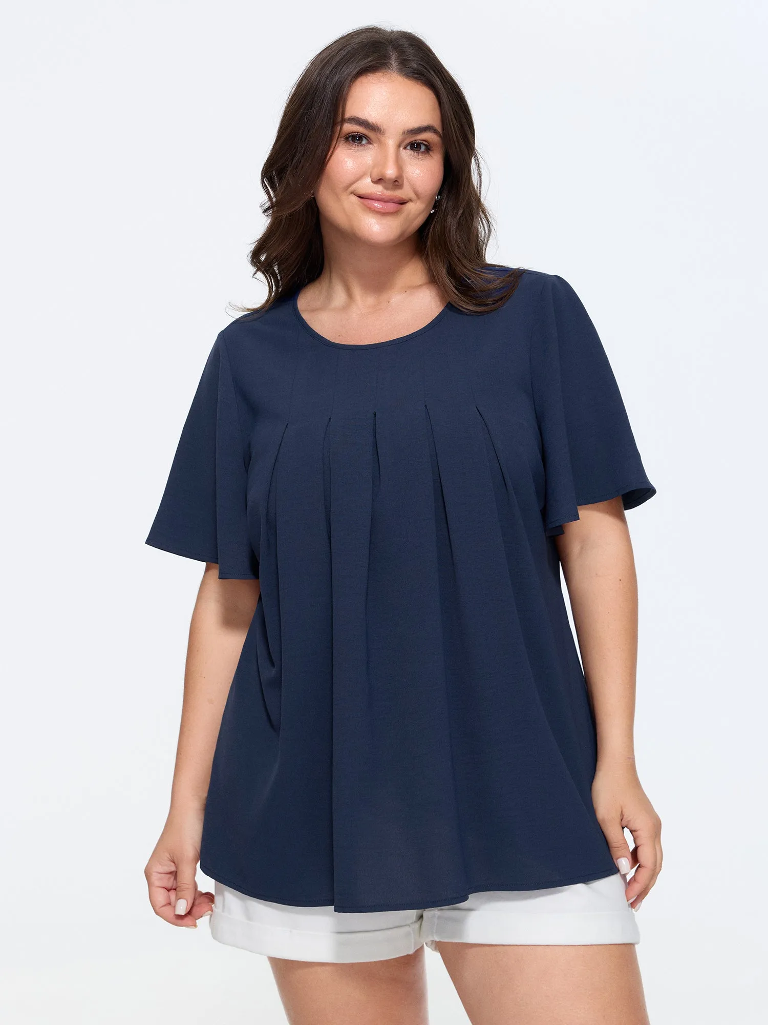 Pleated Front Flowy Plain Top sold by Bloomchic