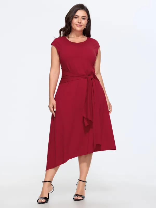 Round Neck Self Tie Waist Asymmetrical Hem Midi Dress made by Bloomchic