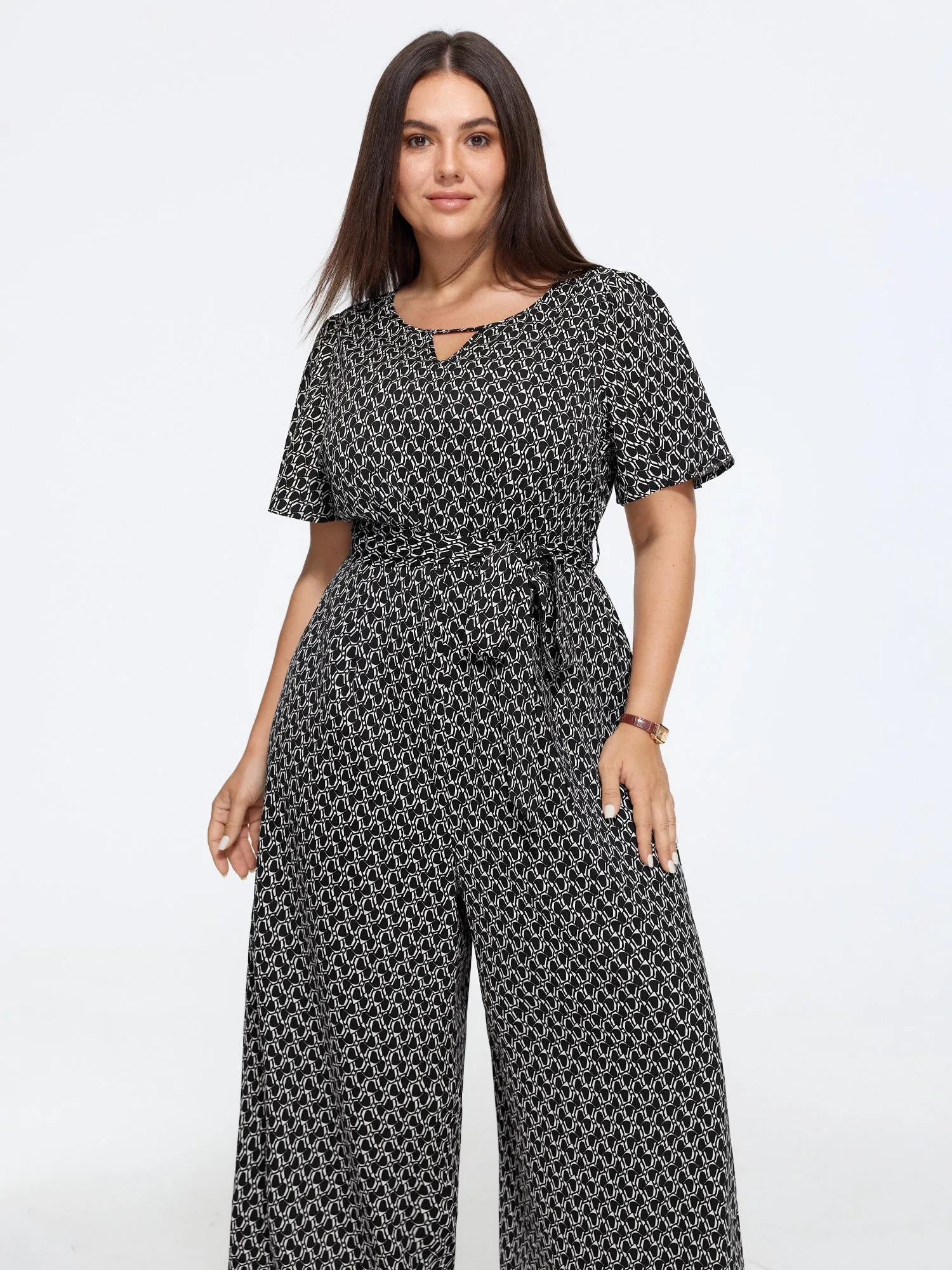 Geometric Print Waist Tie Wide Leg Jumpsuit sold by Bloomchic product image thumbnail 4