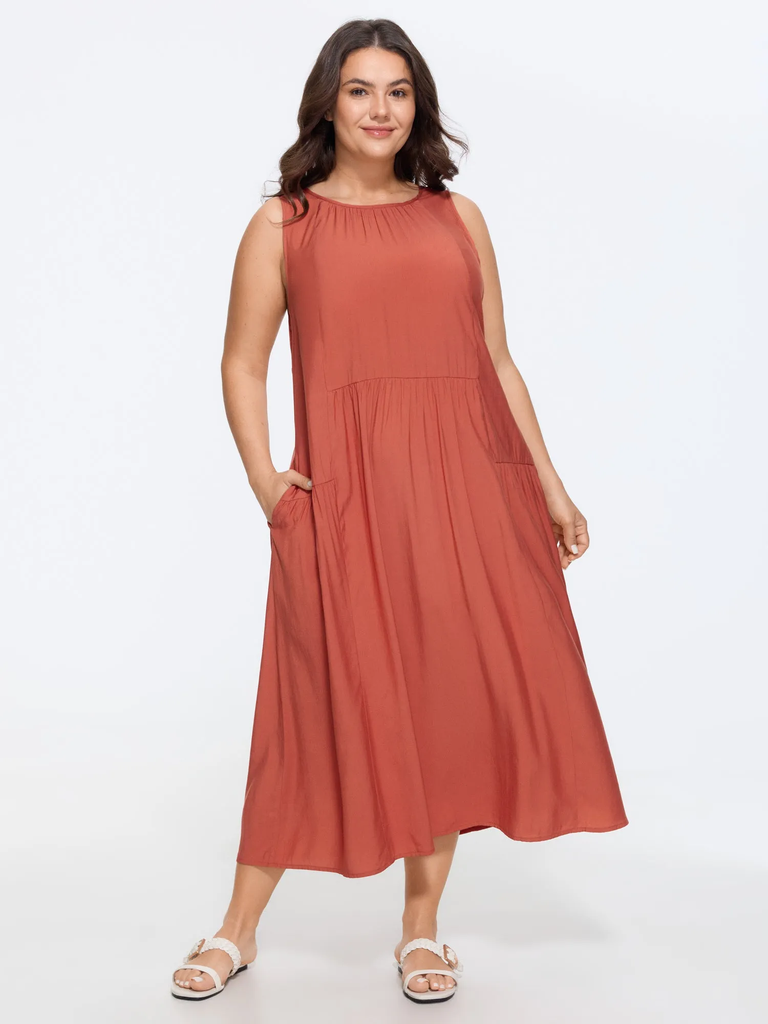 Solid Round Neck Pocket Sleeveless Midi Dress sold by Bloomchic
