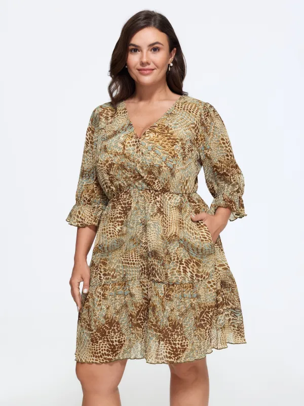 Animal Print Wrap Neck Tiered Mini Dress made by Bloomchic