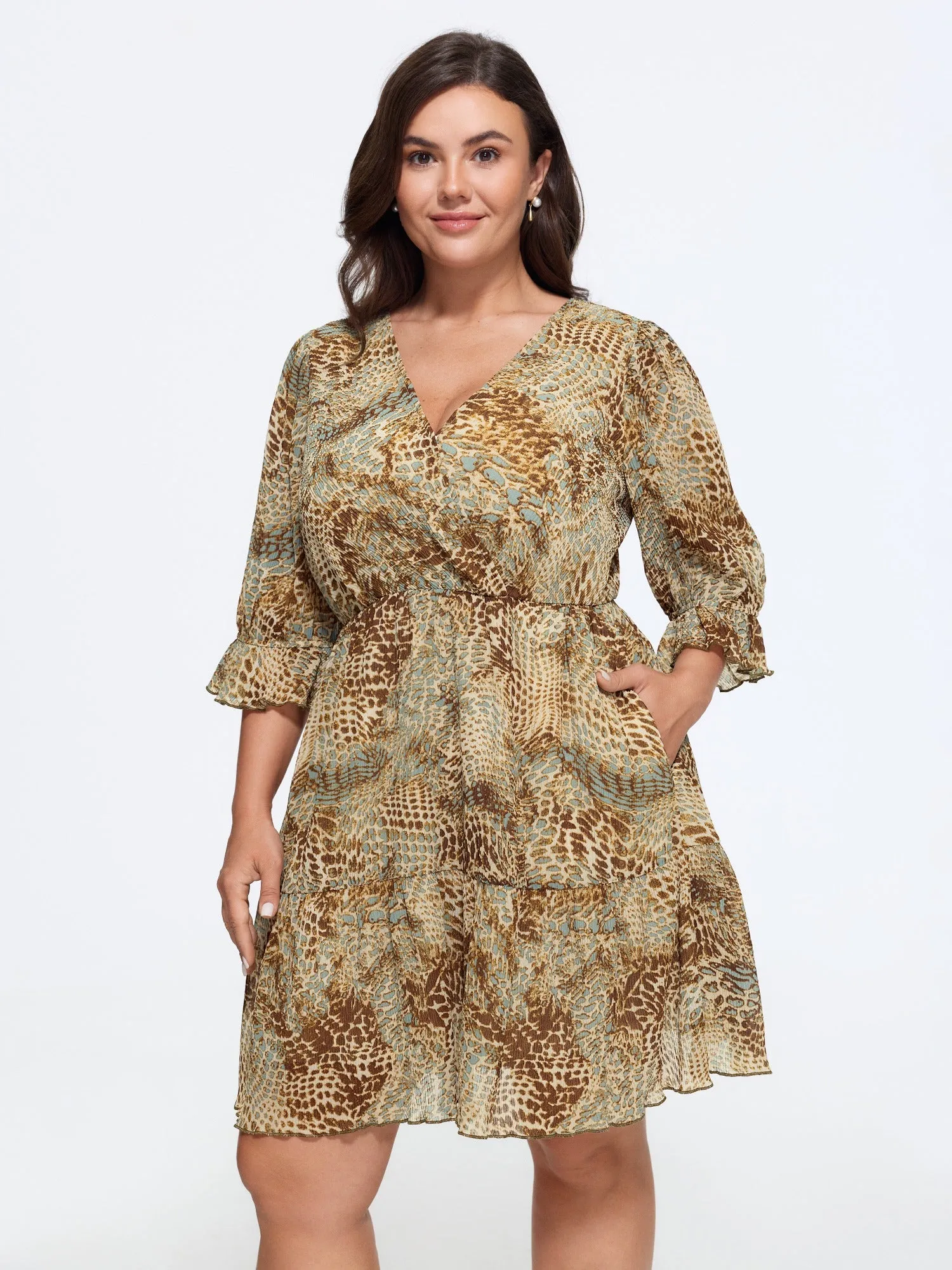 Animal Print Wrap Neck Tiered Mini Dress sold by Bloomchic